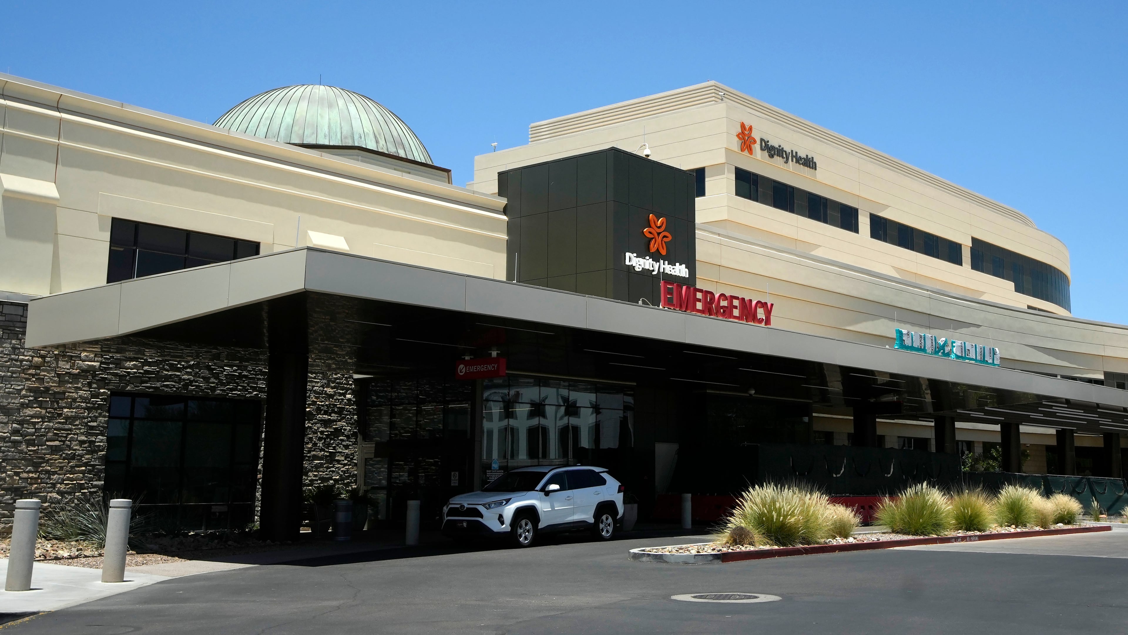 Mercy Gilbert Medical Center, shown here, where an 18-month-old toddler discovered in a backyard pool and taken to the hospital in February, was declared dead before being found breathing hours later in a room that serves as the hospital morgue, according to recently released police records, Monday, July 6, 2026, in Gilbert, Ariz. (AP Photo/Ross D. Franklin)