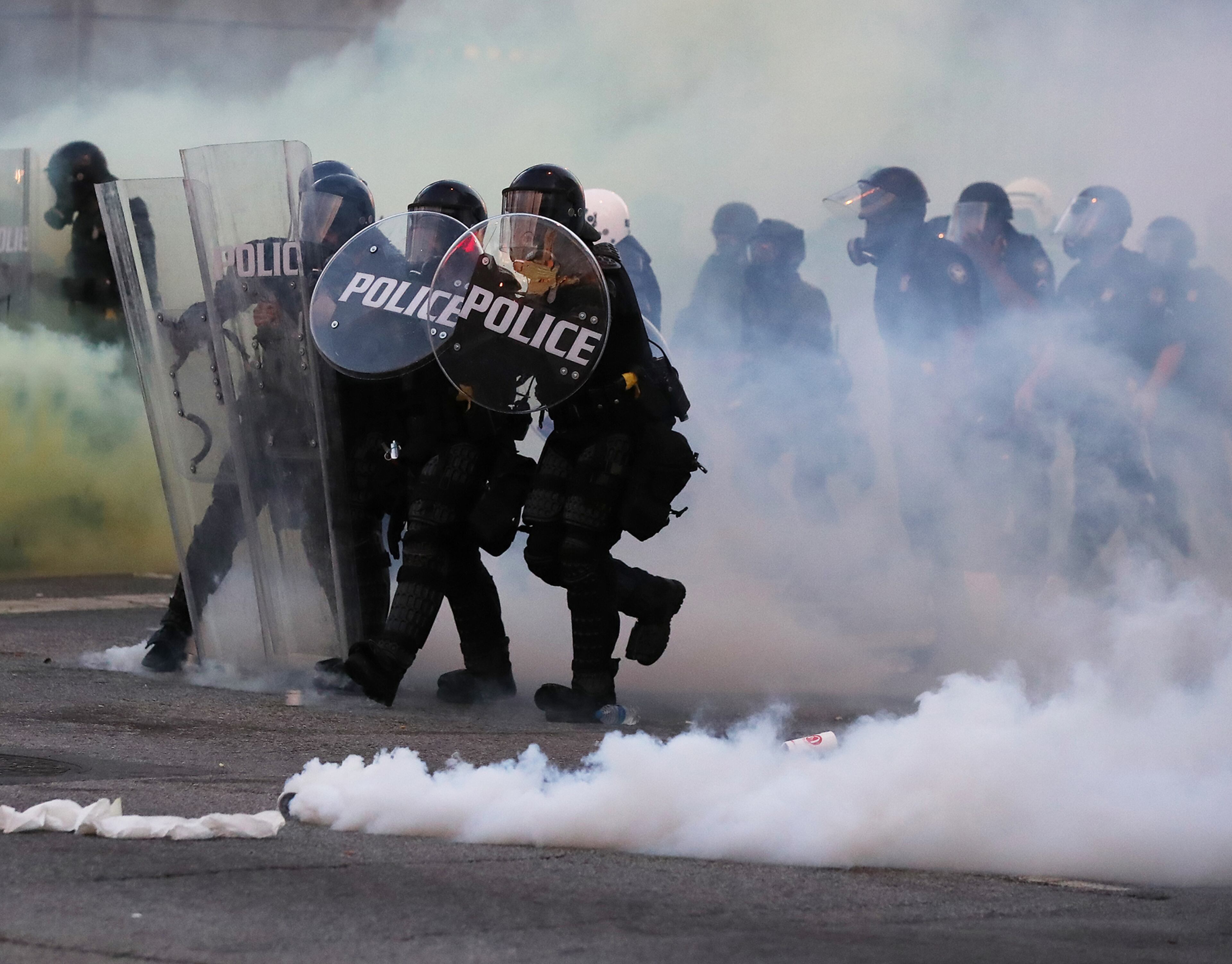 053120 Atlanta: Police advance after firing tear gas at protesters during the third day of protests over the death of George Floyd on Sunday, May 31, 2020, in Atlanta. Curtis Compton ccompton@ajc.com