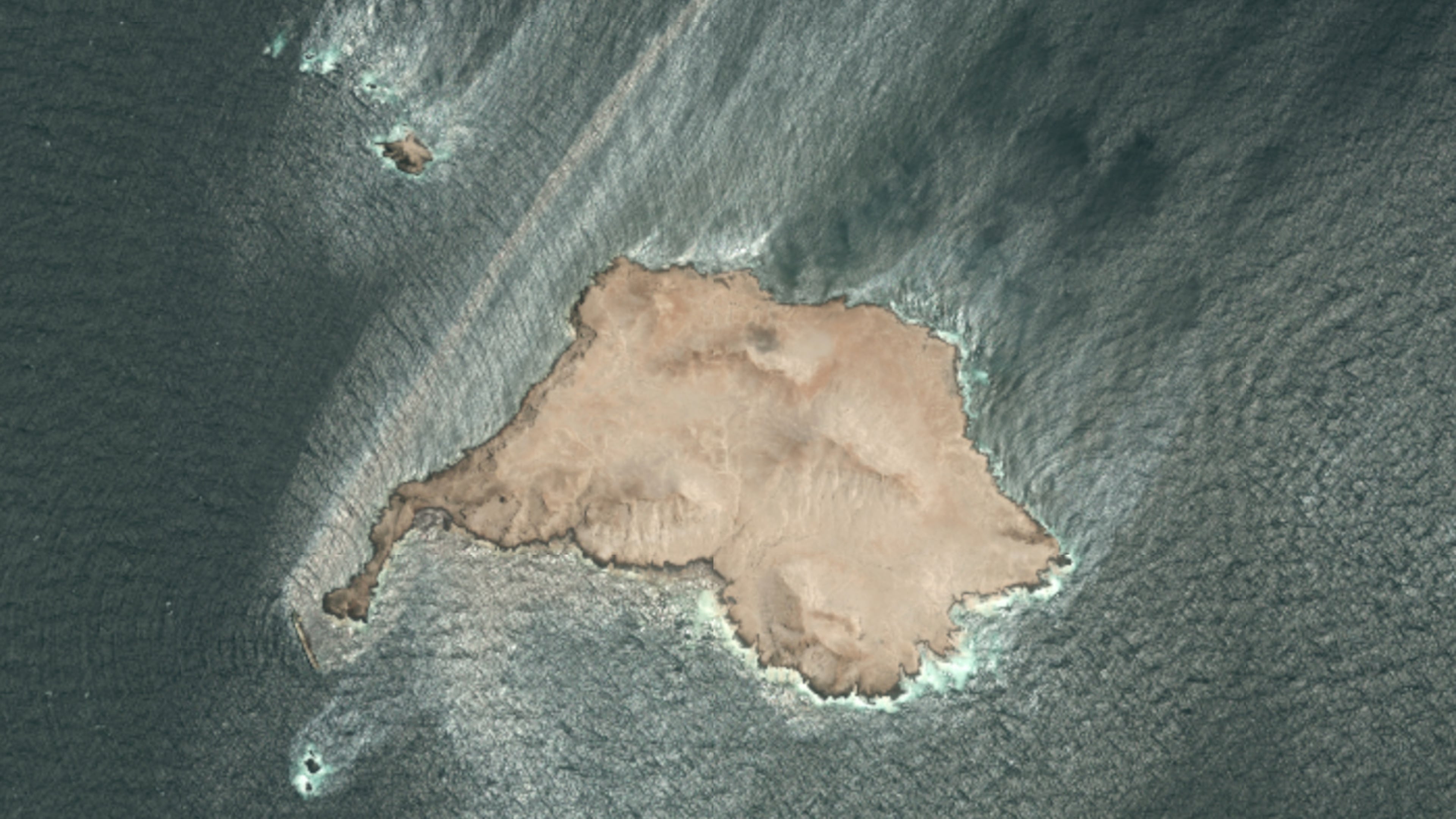 This satellite photo taken Wednesday Aug. 5, 2026, shows the tanker Caroline Bezengi, grounded and partly submerged off the coast of Oman, leaking crude oil into the sea. (Pléiades © CNES 2026, Distribution Airbus DS via AP)