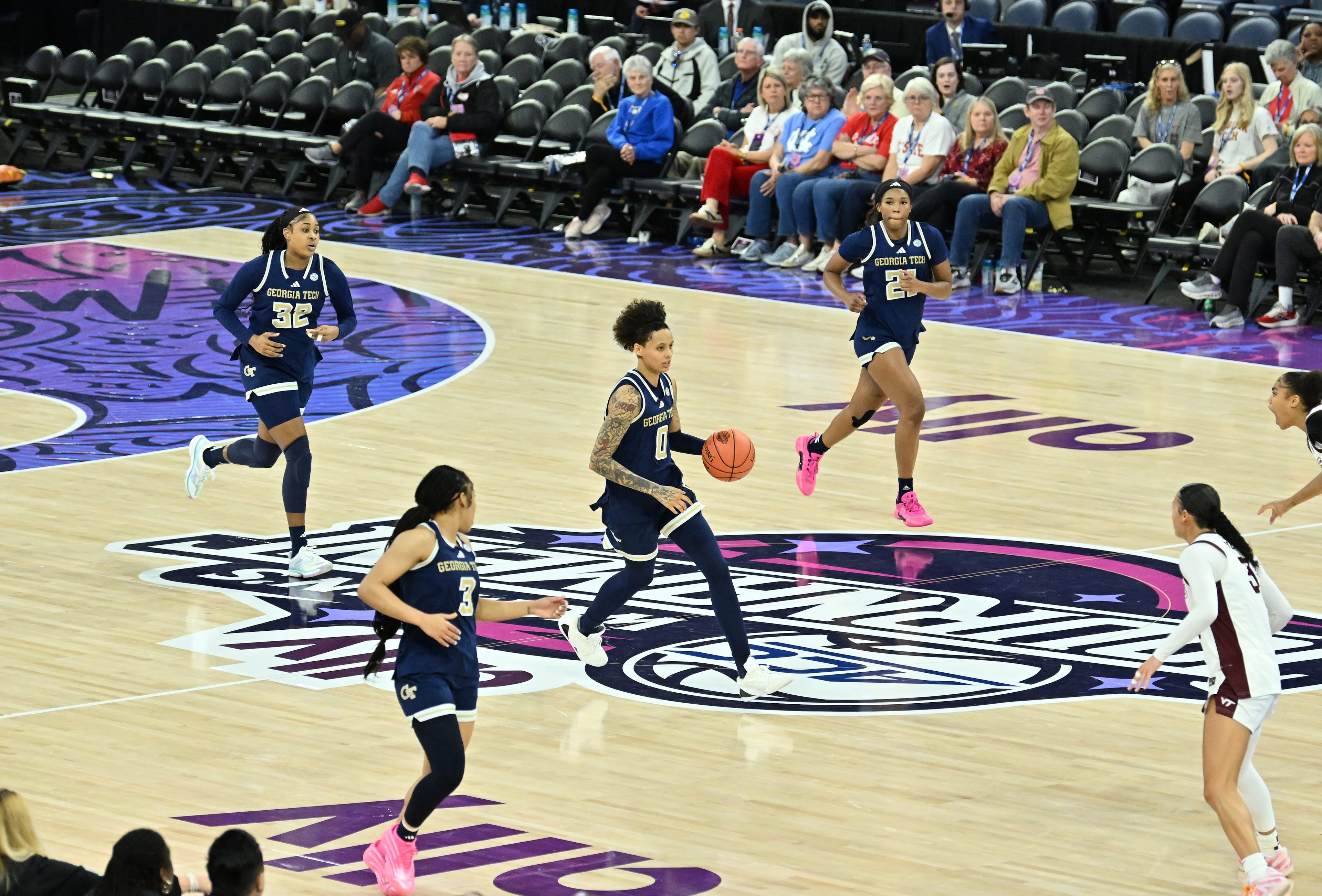 Georgia Tech guard Brianna Turnage (center) brings the ball upcourt during the second half of the ACC women’s basketball tournament at Gas South Arena on Thursday, March 5, 2026, in Duluth. (Hyosub Shin/AJC)