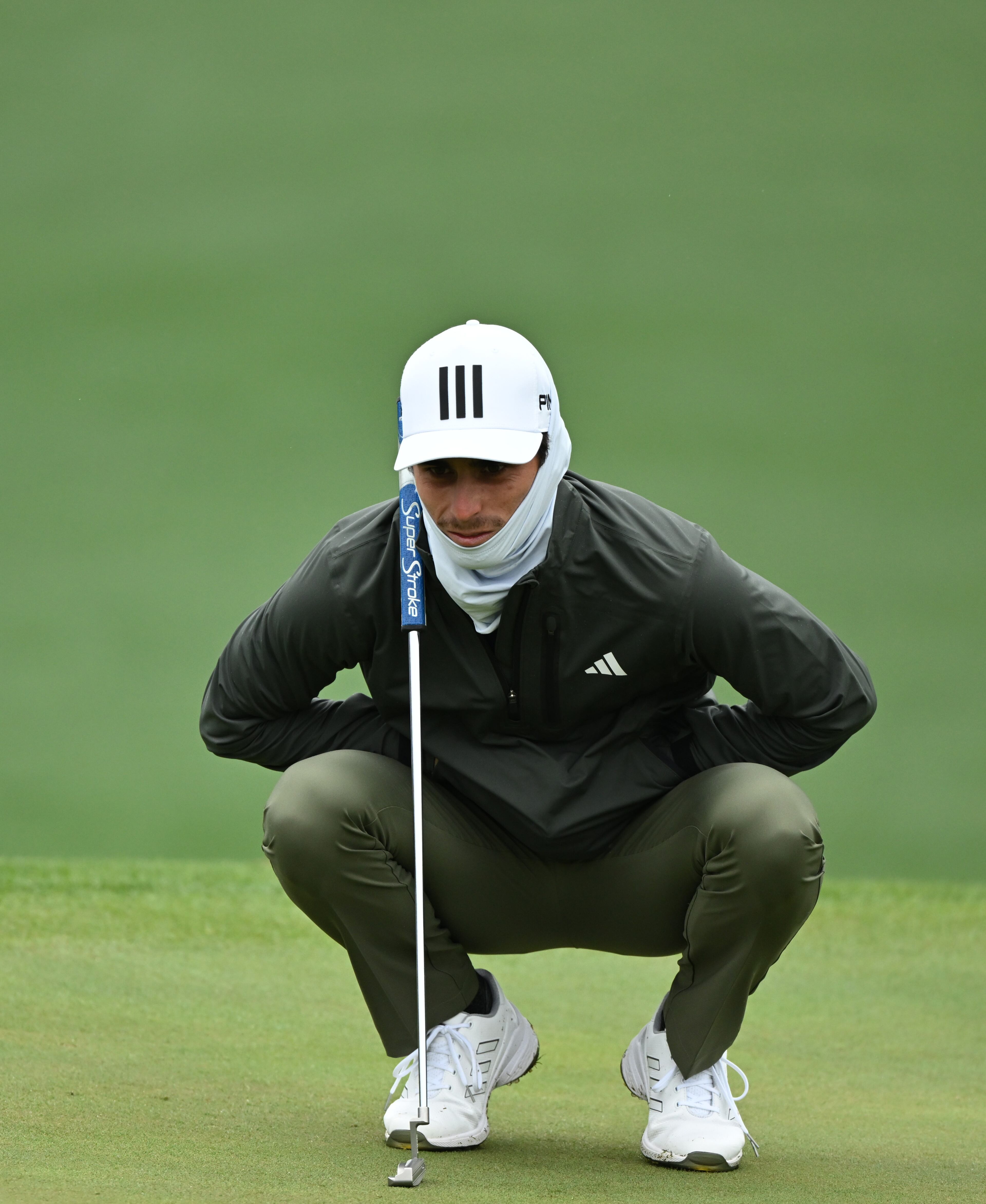Joaquin Niemann lines up a putt on the second hole during third round of the 2023 Masters Tournament at Augusta National Golf Club, Saturday, April 8, 2023, in Augusta, Ga. (Hyosub Shin / Hyosub.Shin@ajc.com)