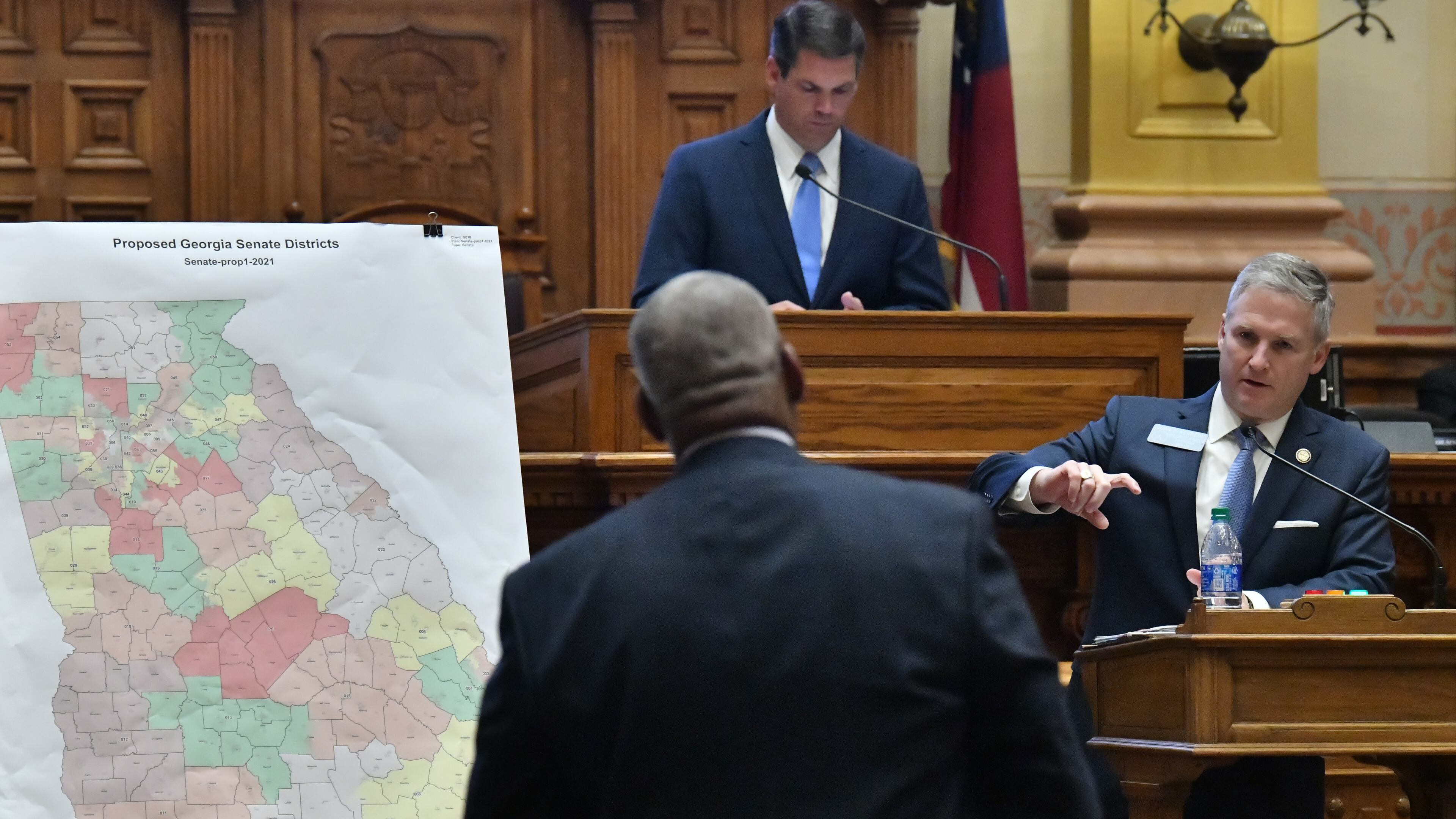 Sen. John Kennedy (R-18, Macon) answers a question from Sen. Emanuel Jones (D-10, Decatur), foreground, in the Senate chamber during a special session at the Georgia State Capitol in Atlanta on Tuesday, November 9, 2021. The hearing was a step toward votes on new political maps for the state House, state Senate and Congress during a once-a-decade redistricting session of the General Assembly. (Hyosub Shin / Hyosub.Shin@ajc.com)