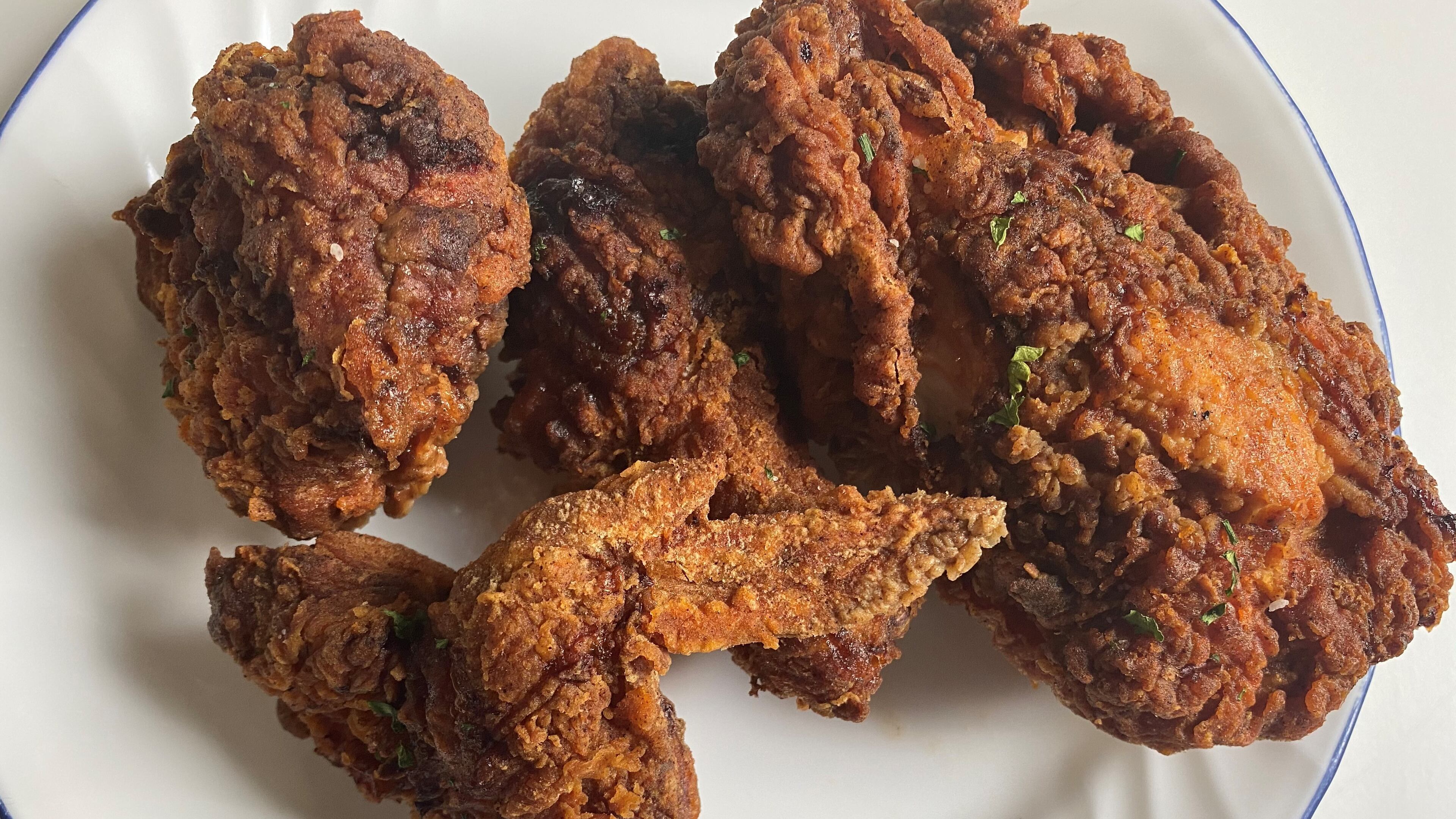 Chicken Out's four-piece crispy fried chicken comes with biscuits and the choice of a side. Bob Townsend for The Atlanta Journal-Constitution