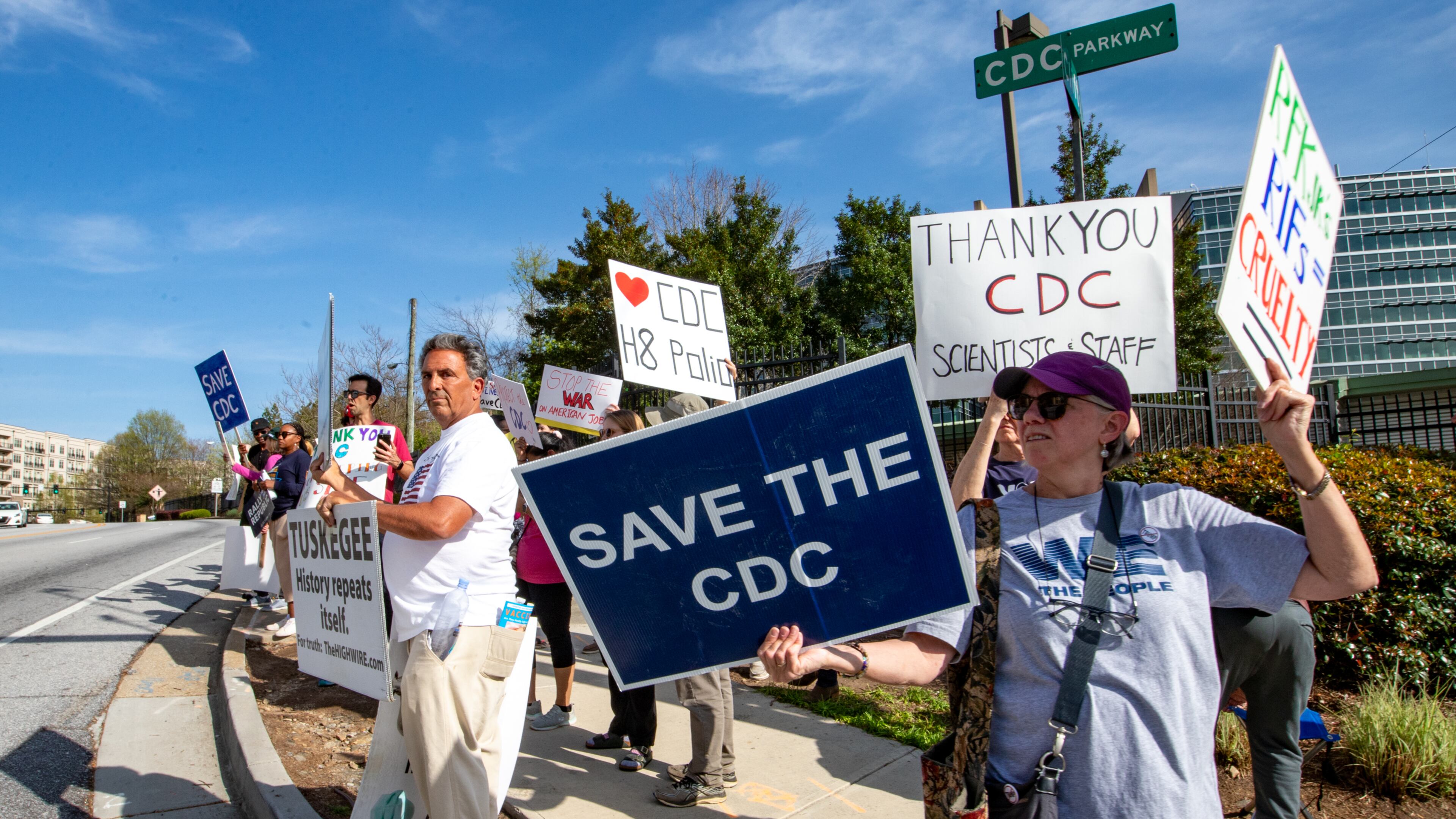 Demonstrators gathered near the Centers for Disease and Control in Atlanta earlier this month to show support for workers and protest layoffs. Jenni Girtman/For the AJC