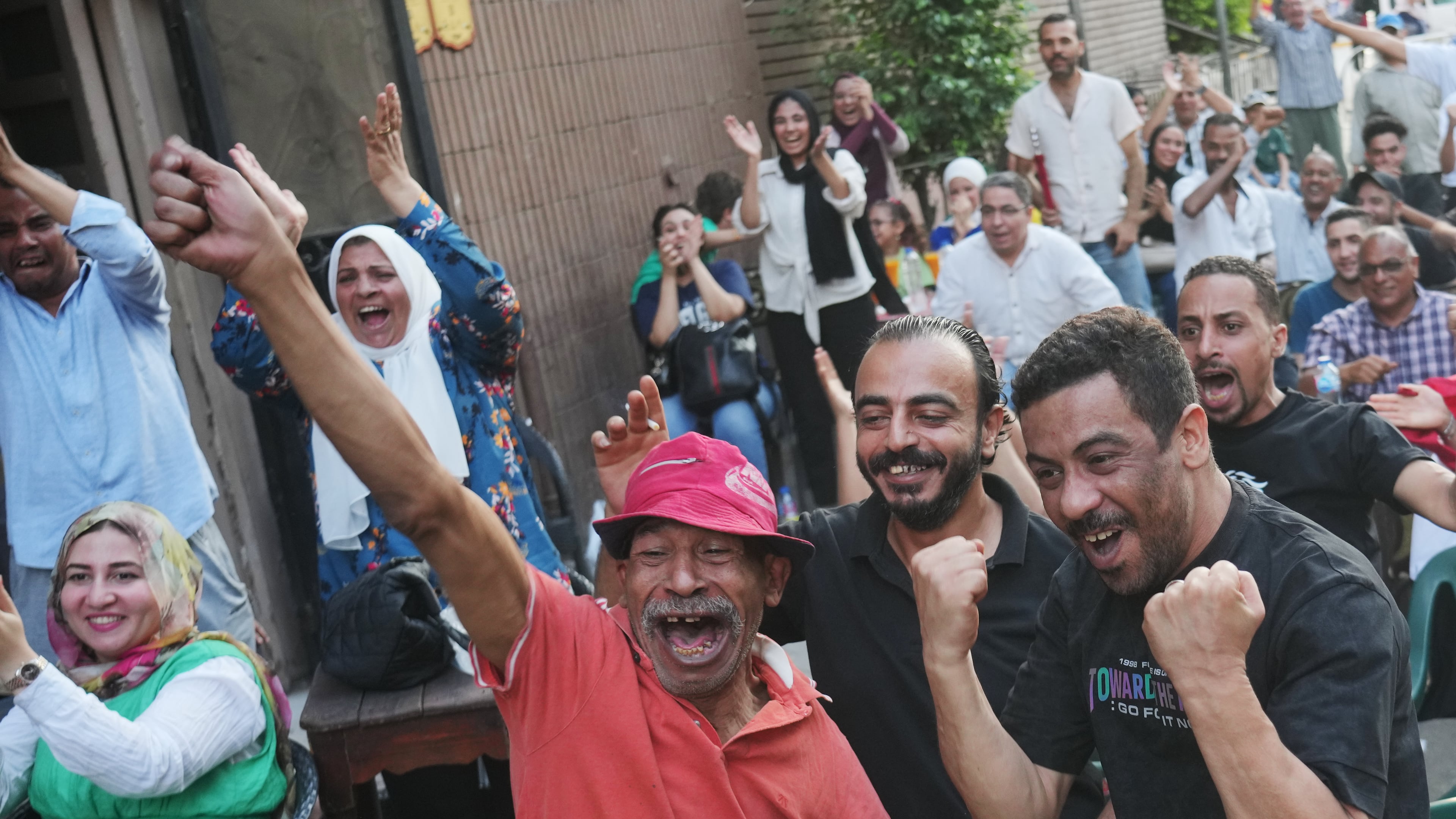 Fans celebrate Egypt's goal on Argentina during a watch party for the World Cup knockout stage, in Cairo, Egypt, Tuesday, July 7, 2026. (AP Photo/Amr Nabil)