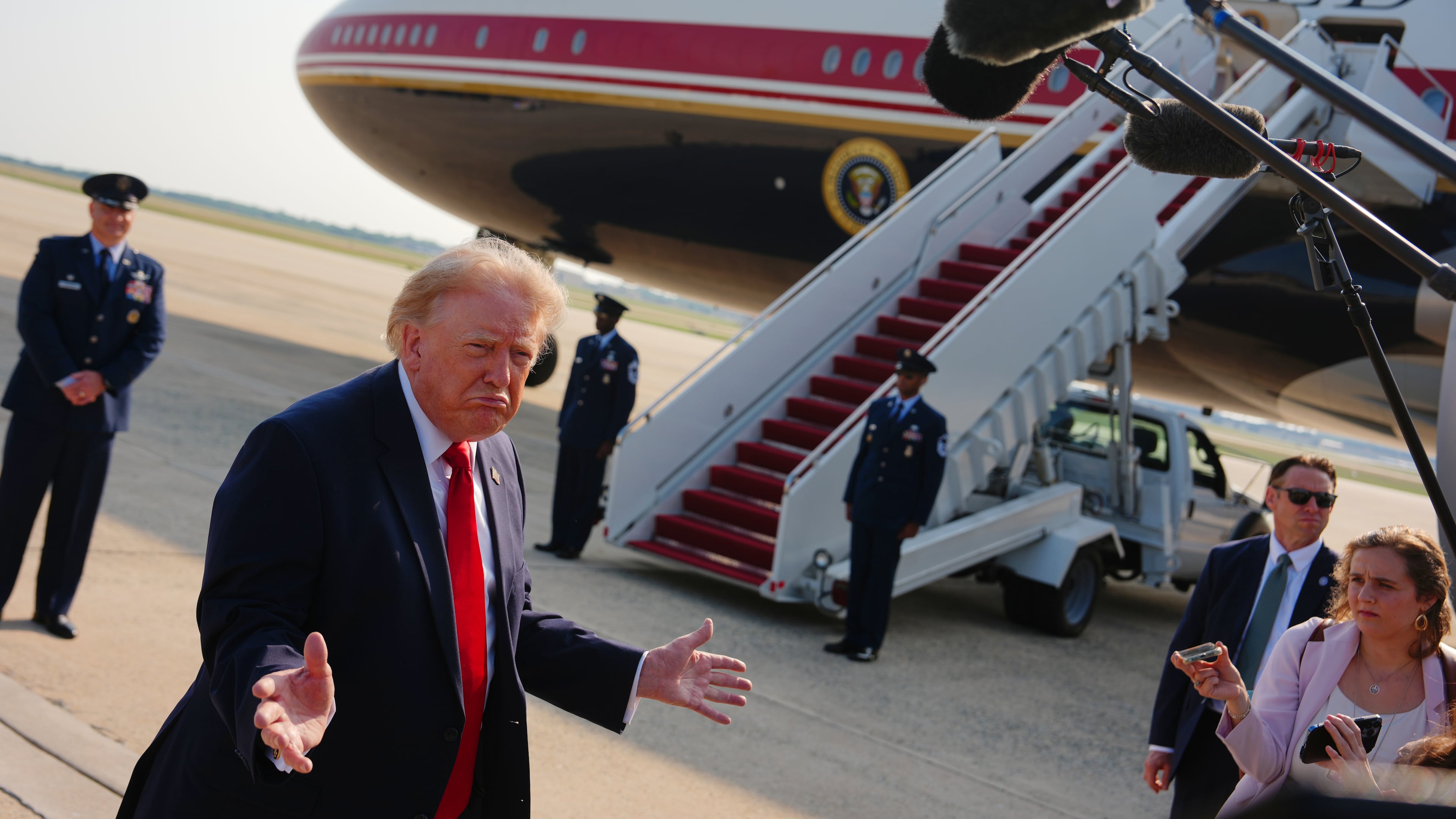 President Donald Trump speaks to reporters before boarding Air Force One, Wednesday, July 1, 2026, at Joint Base Andrews, Md. (AP Photo/Julia Demaree Nikhinson)