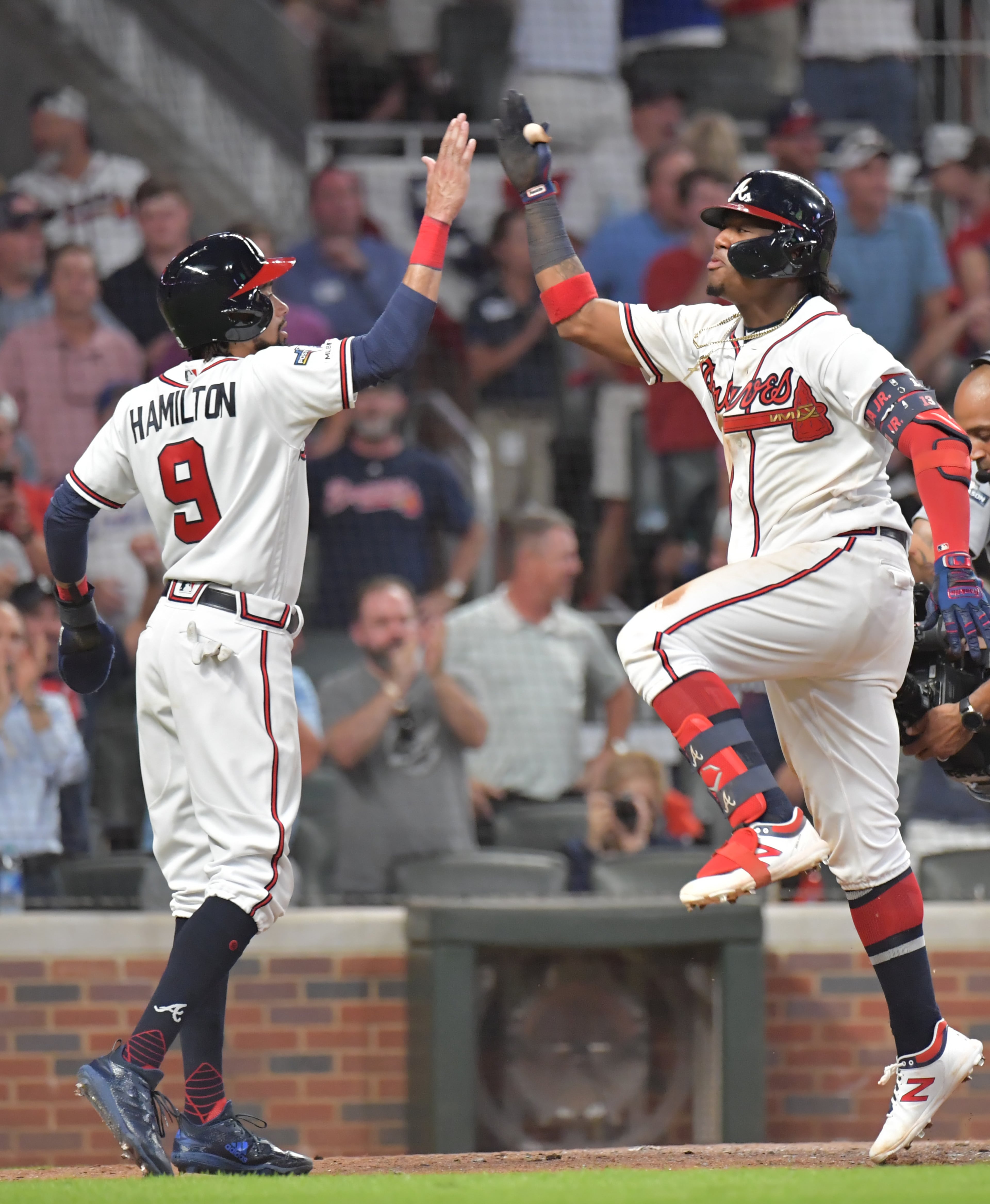 Braves center fielder Ronald Acuna Jr. (right) celebrates his home run. (Hyosub Shin / Hyosub.Shin@ajc.com)
