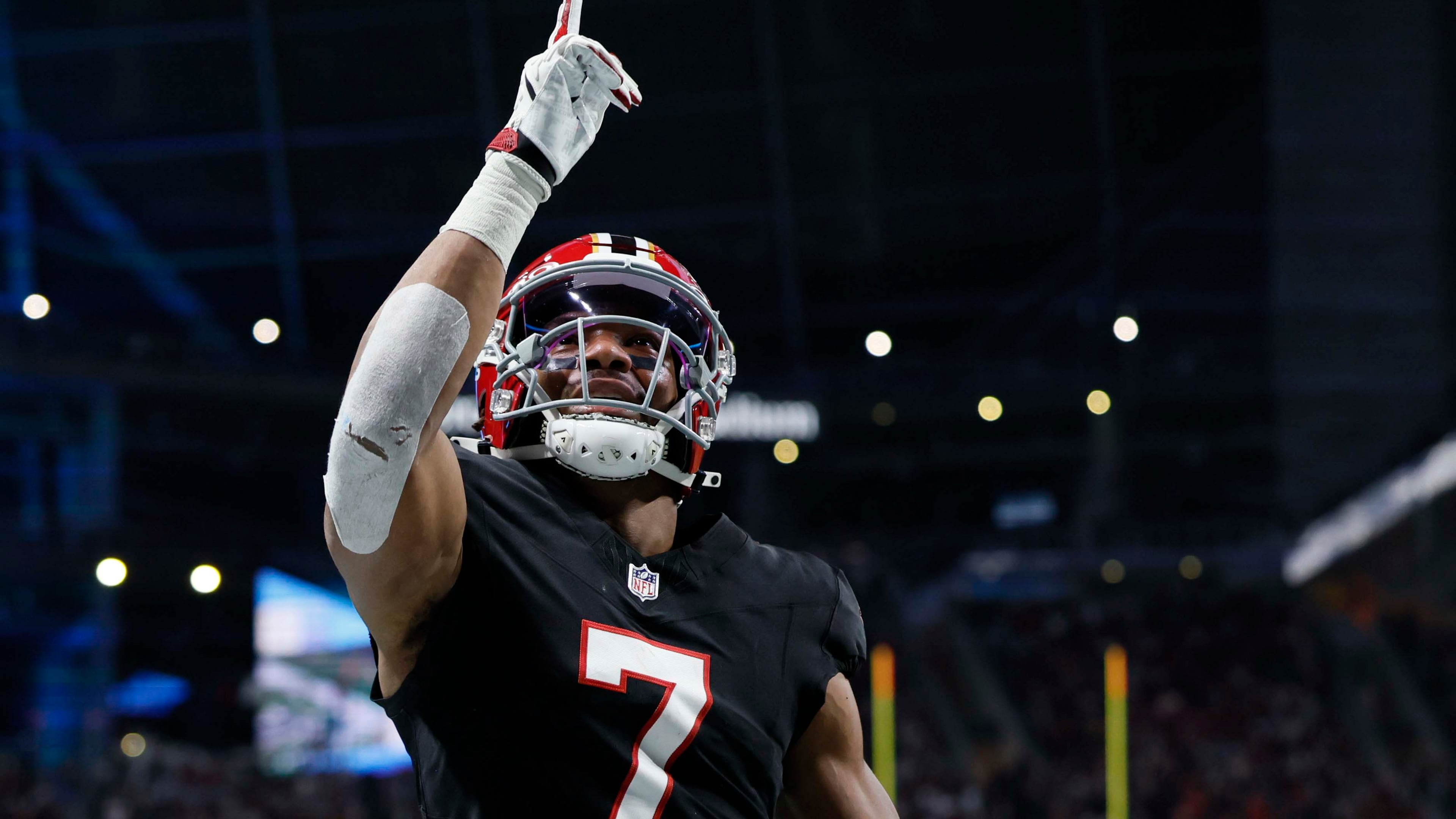 Falcons running back Bijan Robinson celebrates after scoring a touchdown against the Rams at Mercedes-Benz Stadium in Atlanta on Monday, Dec. 29, 2025. (Miguel Martinez / AJC)