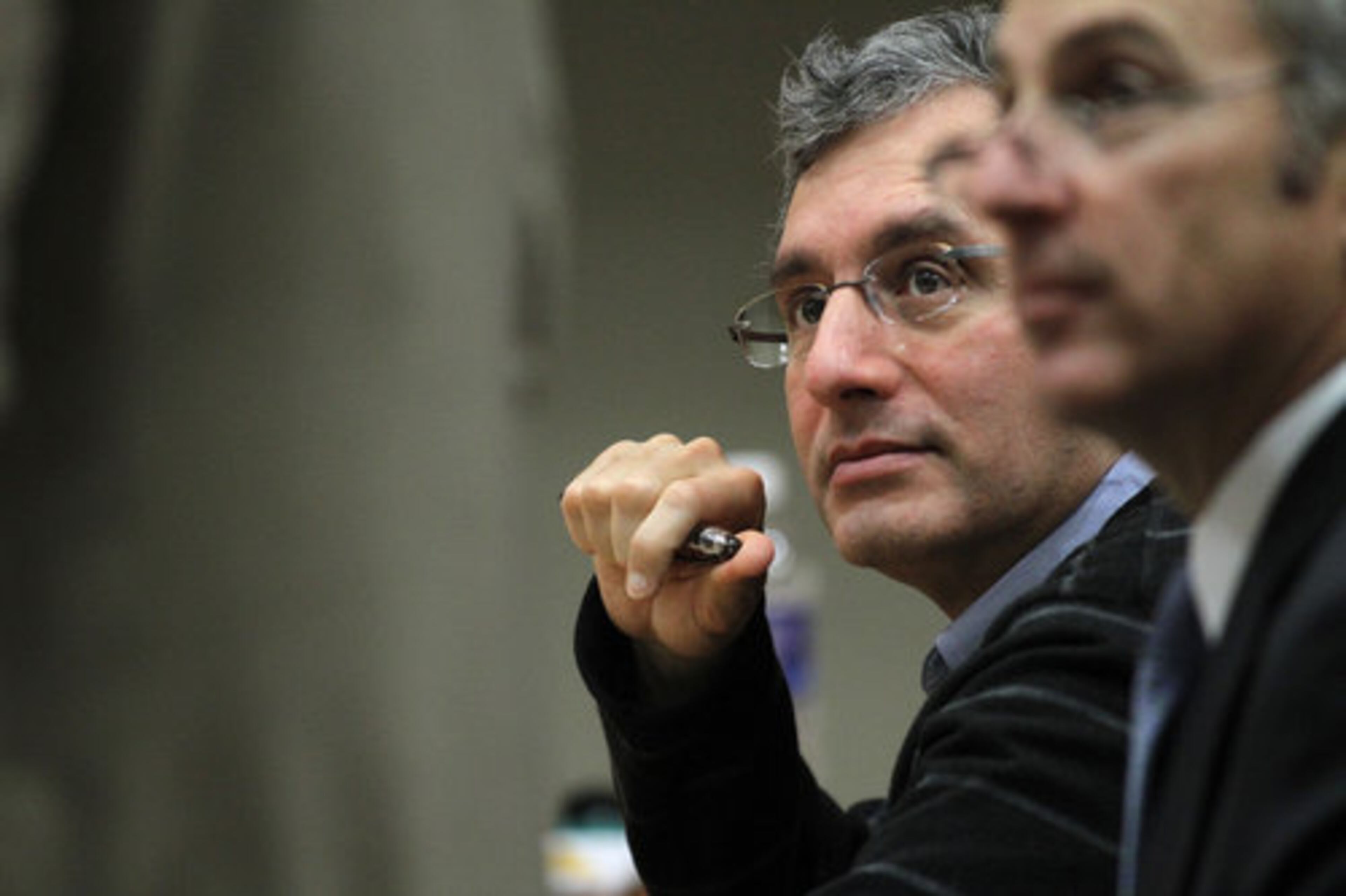 Hemy Neuman looks on as an attorney speaks in DeKalb Superior Court Thursday.