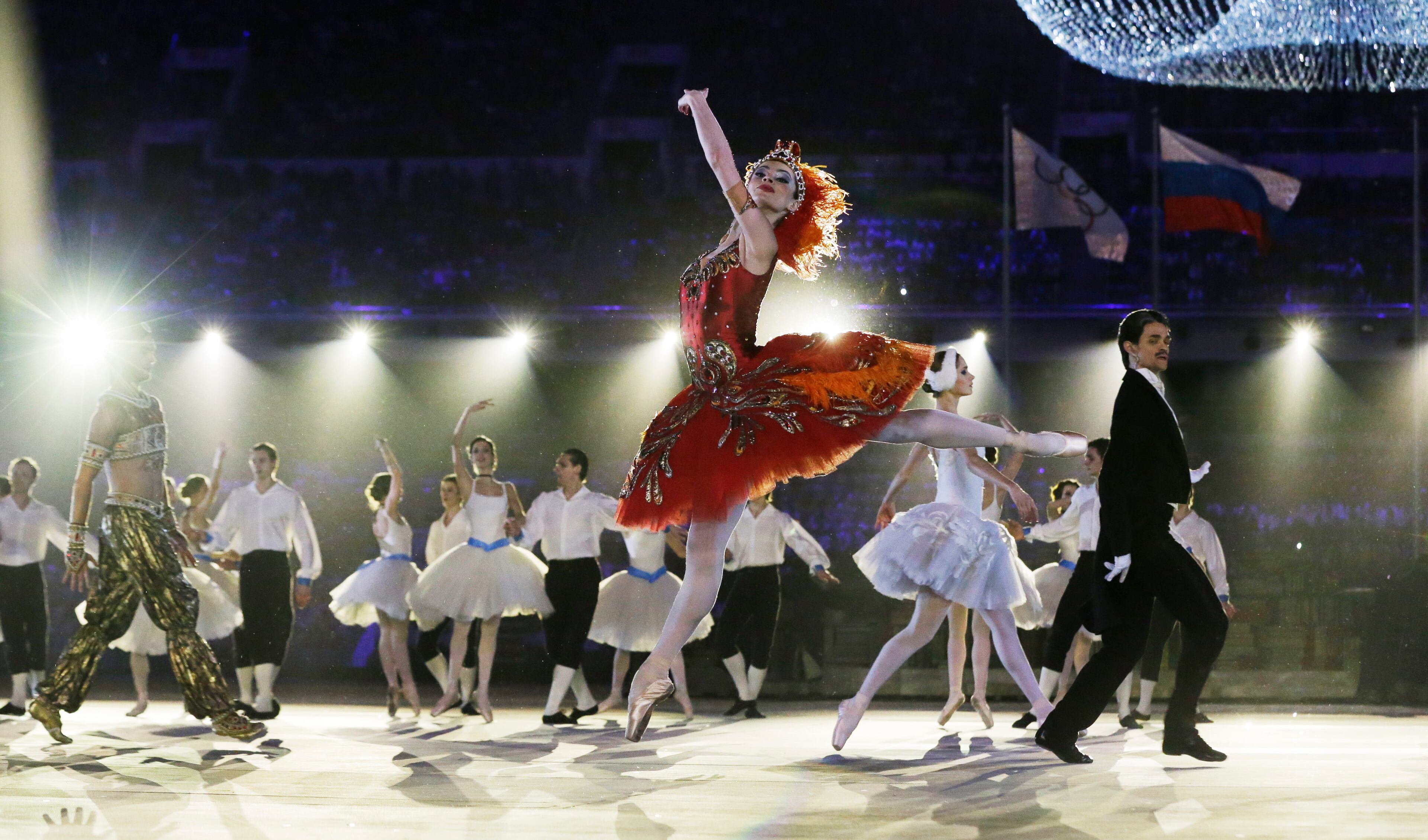 Performers dance during the closing ceremony of the 2014 Winter Olympics, Sunday, Feb. 23, 2014, in Sochi, Russia. (AP Photo/Darron Cummings)