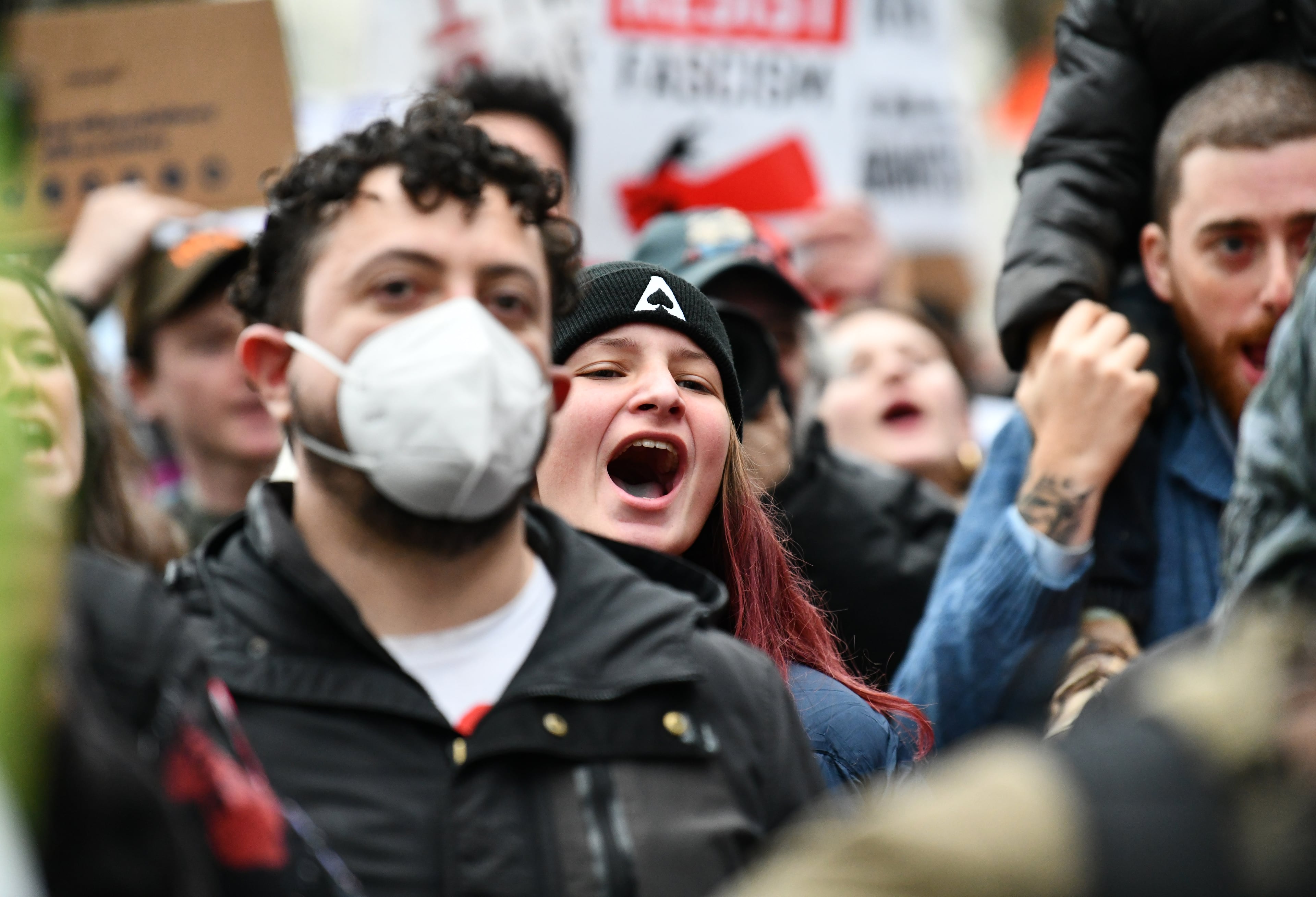 Protesters chant as they gather to protest federal agents presence in Minnesota outside ICE’s Atlanta Field Office, Friday, Jan. 23, 2026, in Atlanta. (Hyosub Shin/AJC)