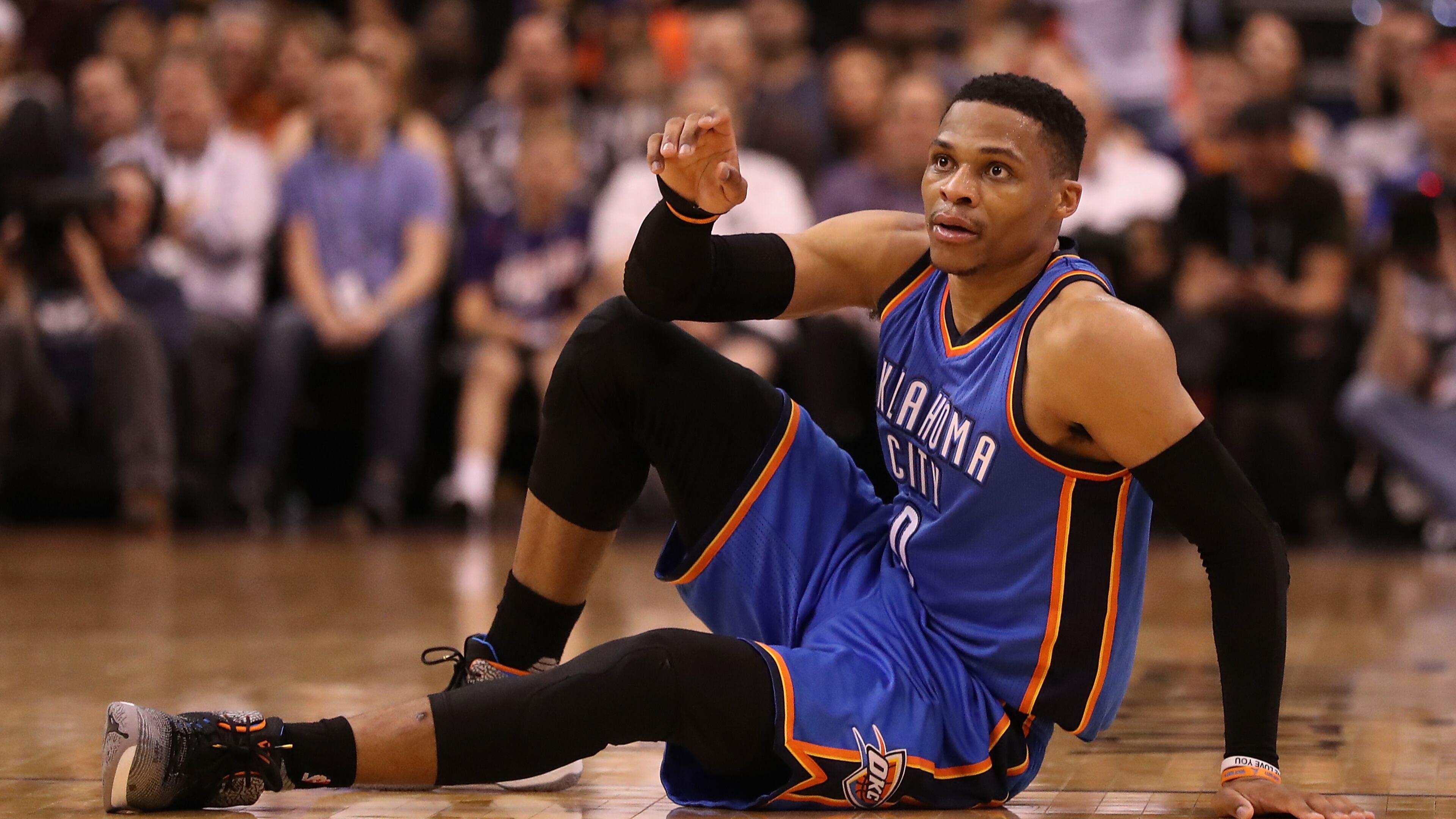 Russell Westbrook of the Oklahoma City Thunder tied a 55-year-old NBA record Friday night when he clinched a triple-double average for the season.