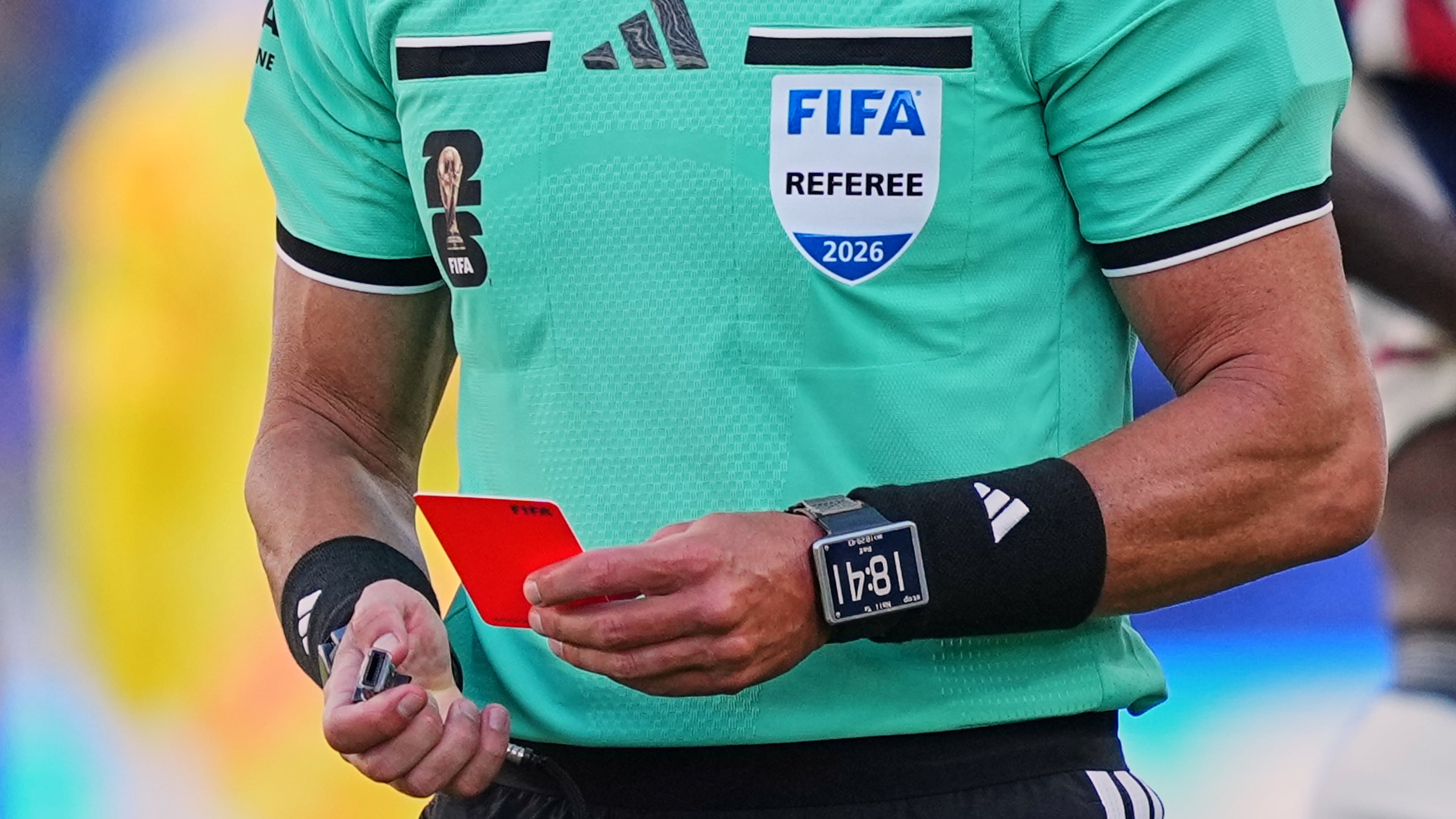 FILE - Referee Raphael Claus, of Brazil, holds the red card after sending United States' Folarin Balogun off the pitch during the World Cup round of 32 soccer match between the United States and Bosnia in Santa Clara, Calif., near San Francisco, Wednesday, July 1, 2026. (AP Photo/Martin Meissner, File)
