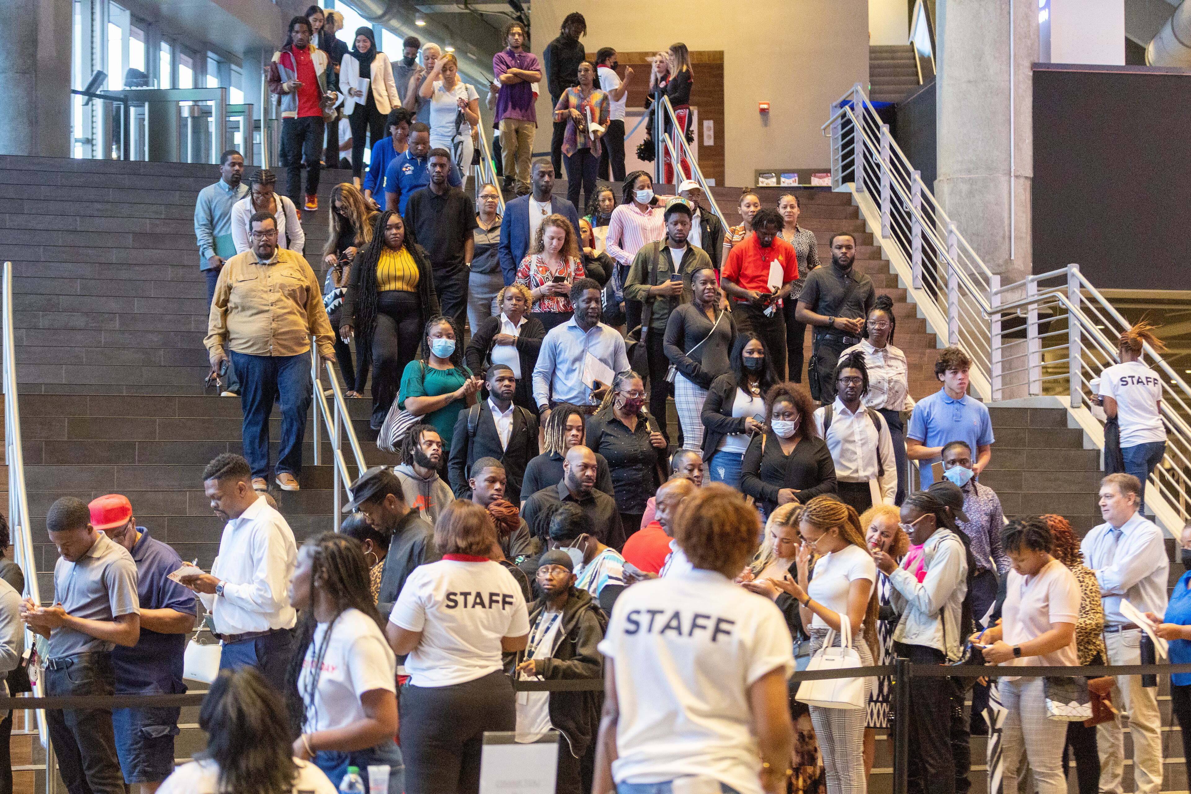 A crowd lines up to get into State Farm Arena for the Hawks' inaugural "Interview Day" event to fill hundreds of jobs on Saturday, September 10, 2022. (Photo: Steve Schaefer/steve.schaefer@ajc.com)