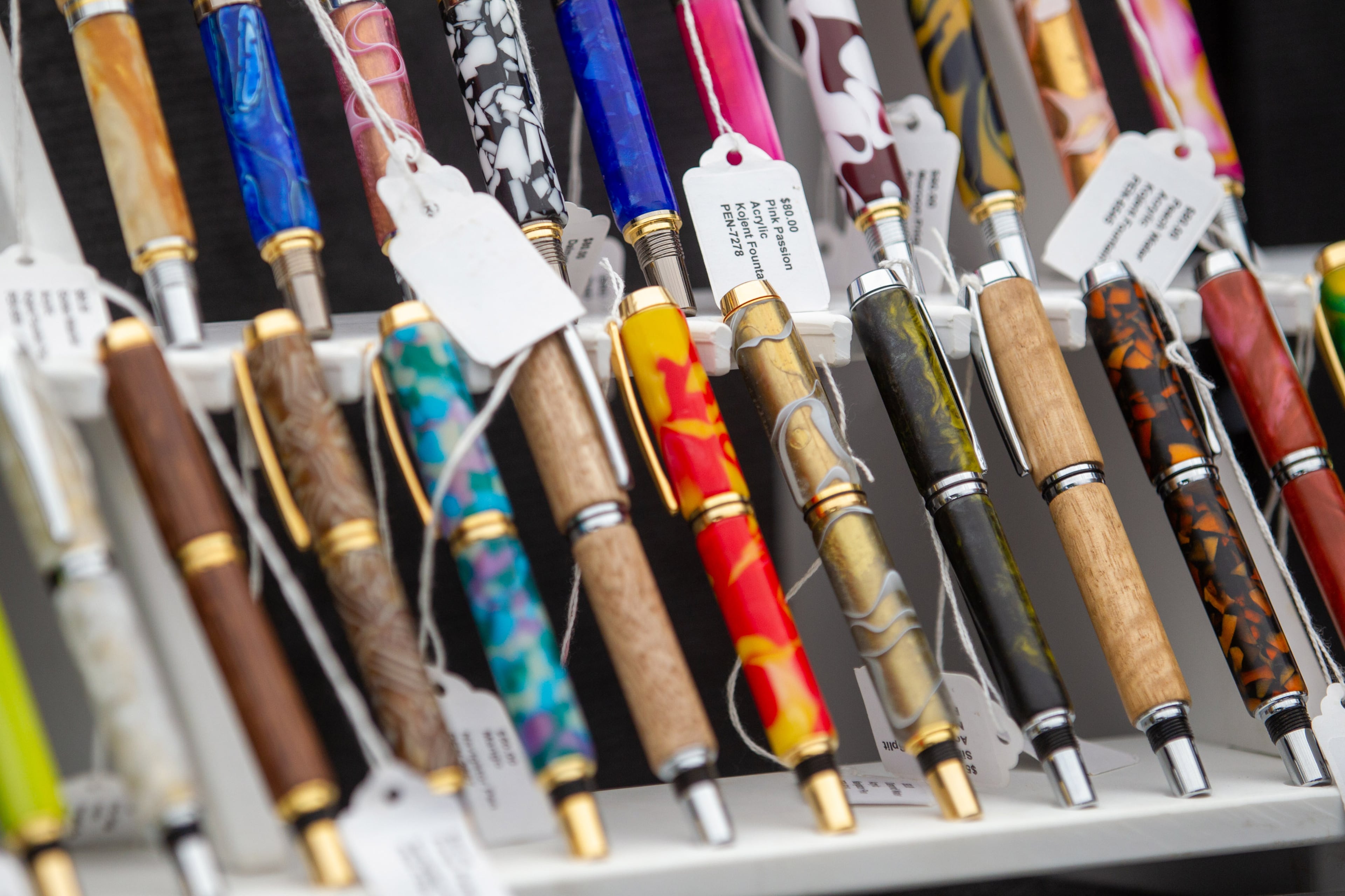 Handcrafted pens sit on display during the Roswell Spring Arts and Crafts Festival on Sunday, June 13, 2021. (Photo: Steve Schaefer for The Atlanta Journal-Constitution)