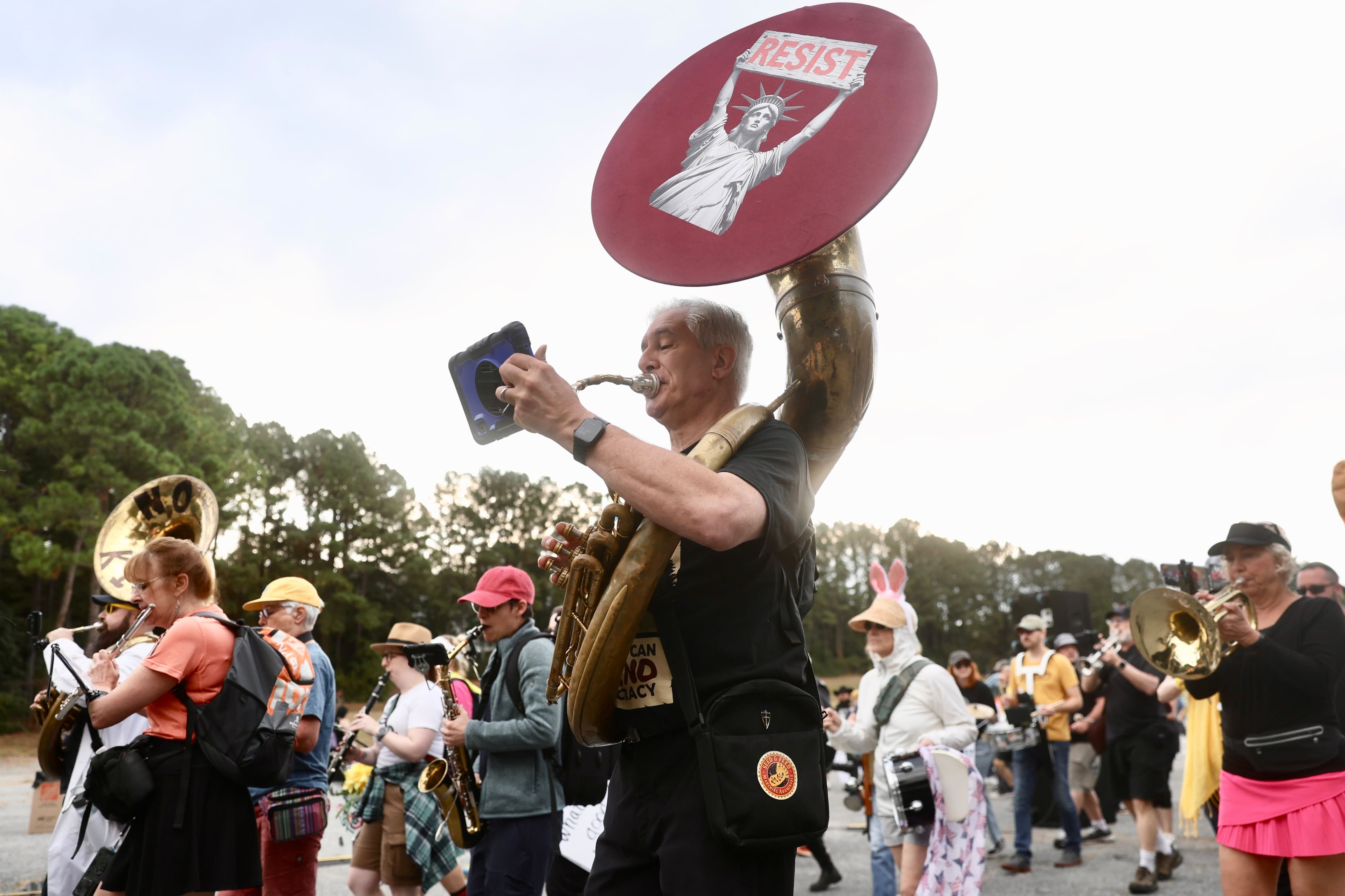 A marching band took part in the "No Kings" protest on Saturday. (Abbey Cutrer/AJC)