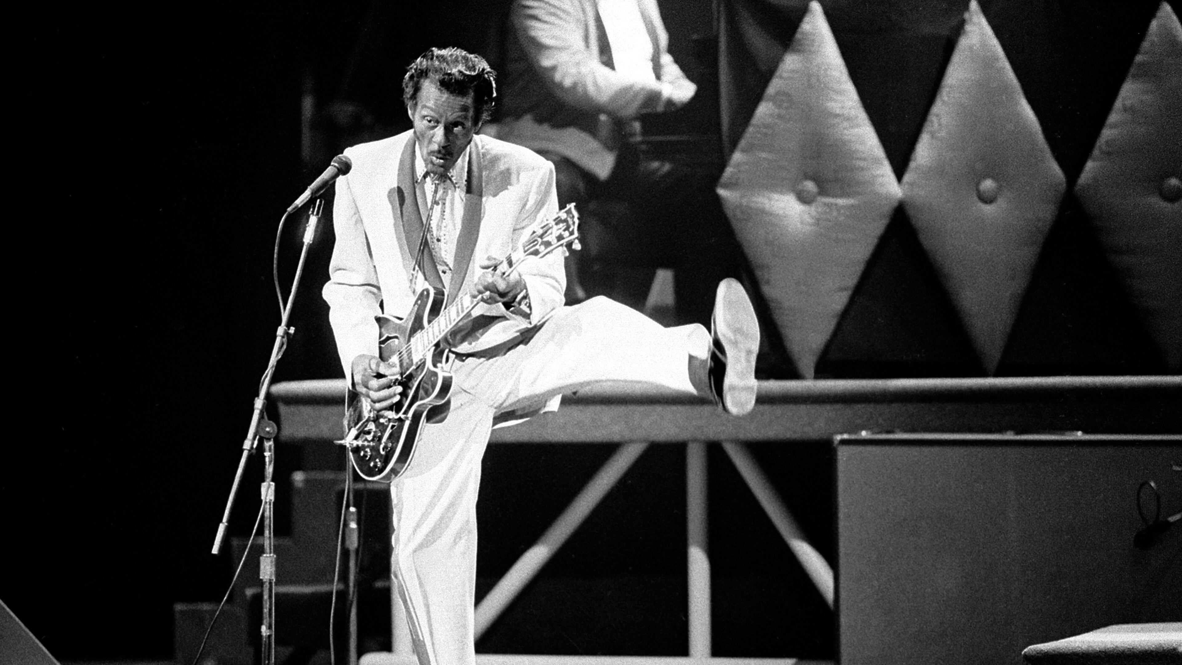 In this Oct. 17, 1986 file photo, Chuck Berry performs during a concert celebration for his 60th birthday at the Fox Theatre in St. Louis, Mo. On Saturday, March 18, 2017, police in Missouri said Berry has died at the age of 90. (AP Photo/James A. Finley)