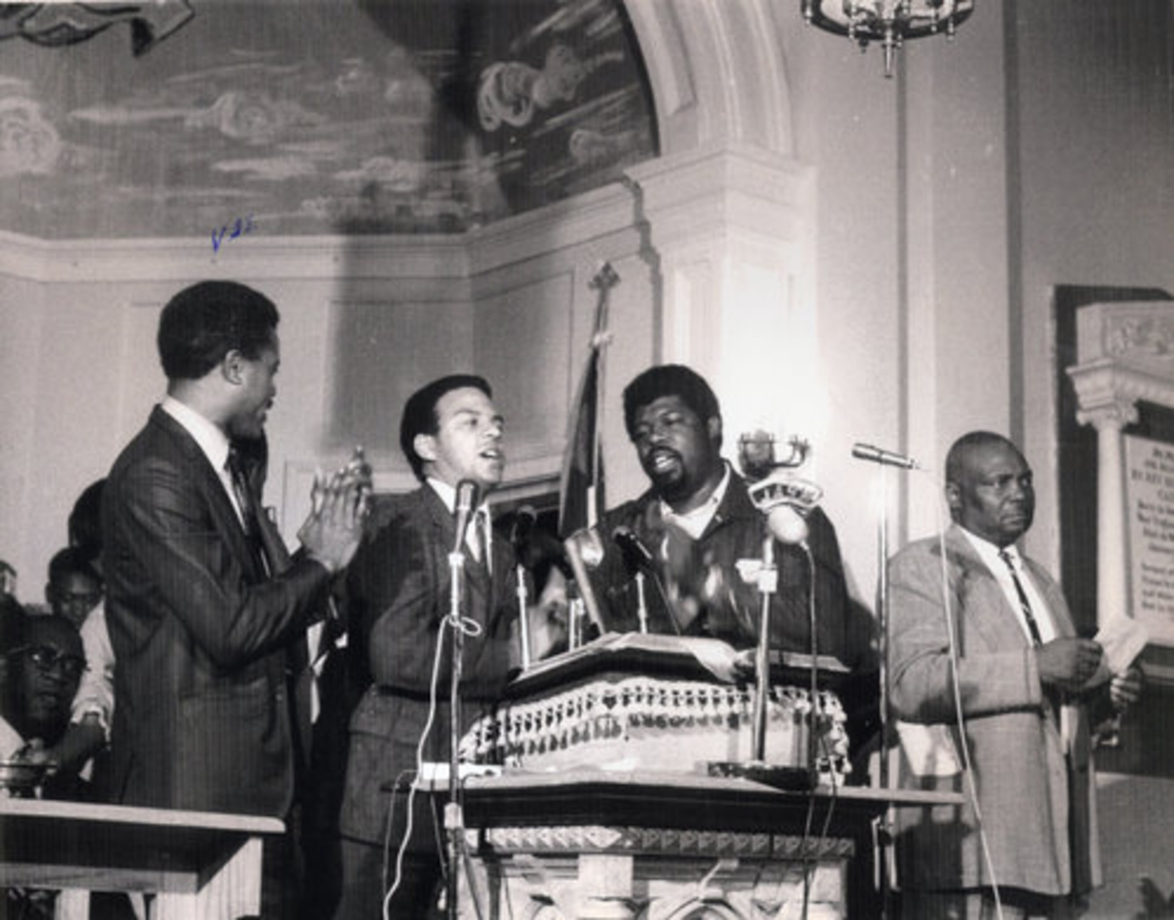J. T. Johnson (from left), Andrew Young, Rev. James Orange, (unidentified man). Photo courtesy of J. T. Johnson