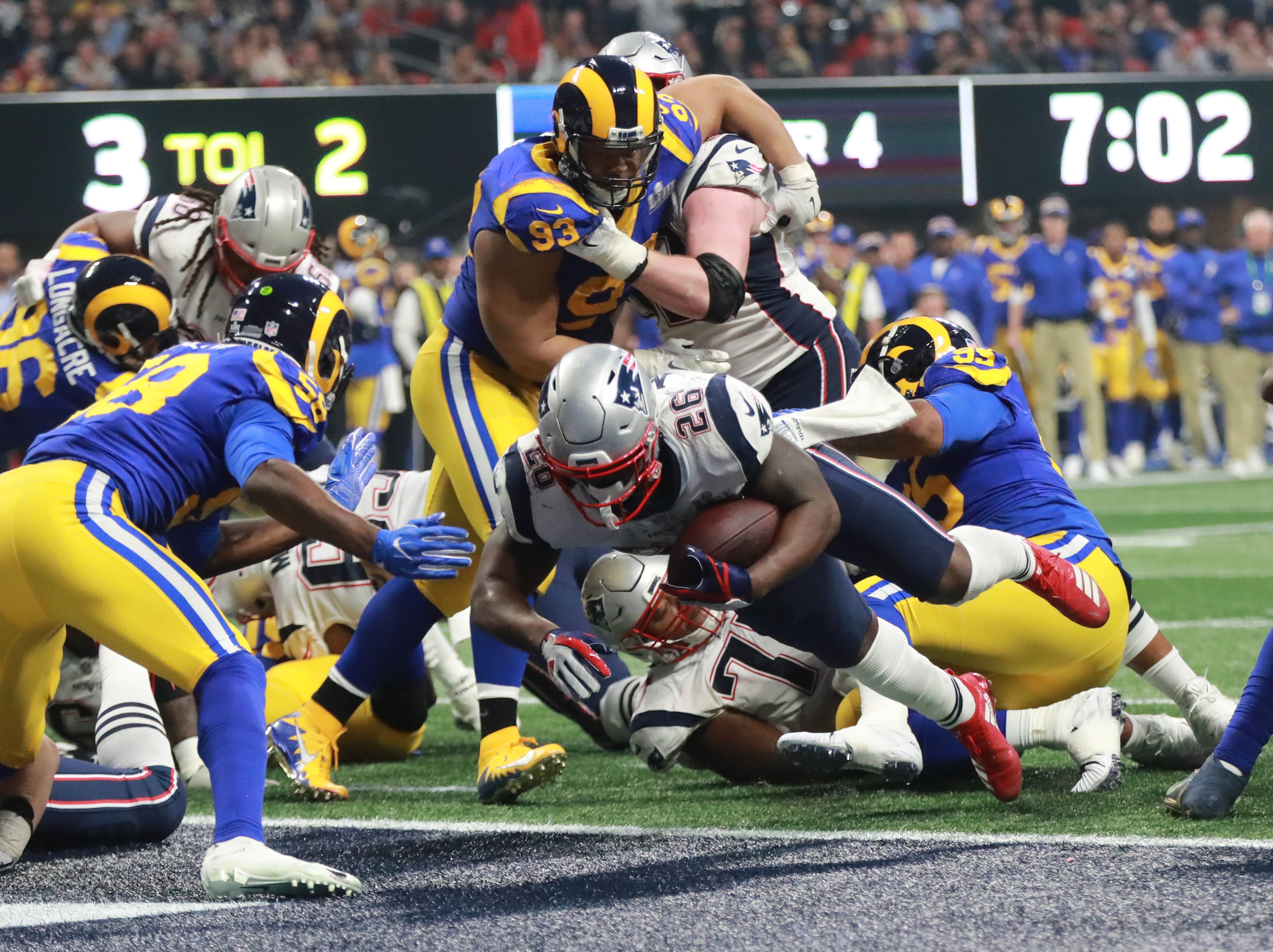 2/3/19 - Atlanta - New England Patriots running back Sony Michel (26) rushes for the touchdown to give the New England Patriots the lead, 10-3, in the fourth quarter during the Super Bowl LIII on Sunday, Feb. 3, 2019 at Mercedes-Benz Stadium in Atlanta, Ga. 
CURTIS COMPTON / CCOMPTON@AJC.COM