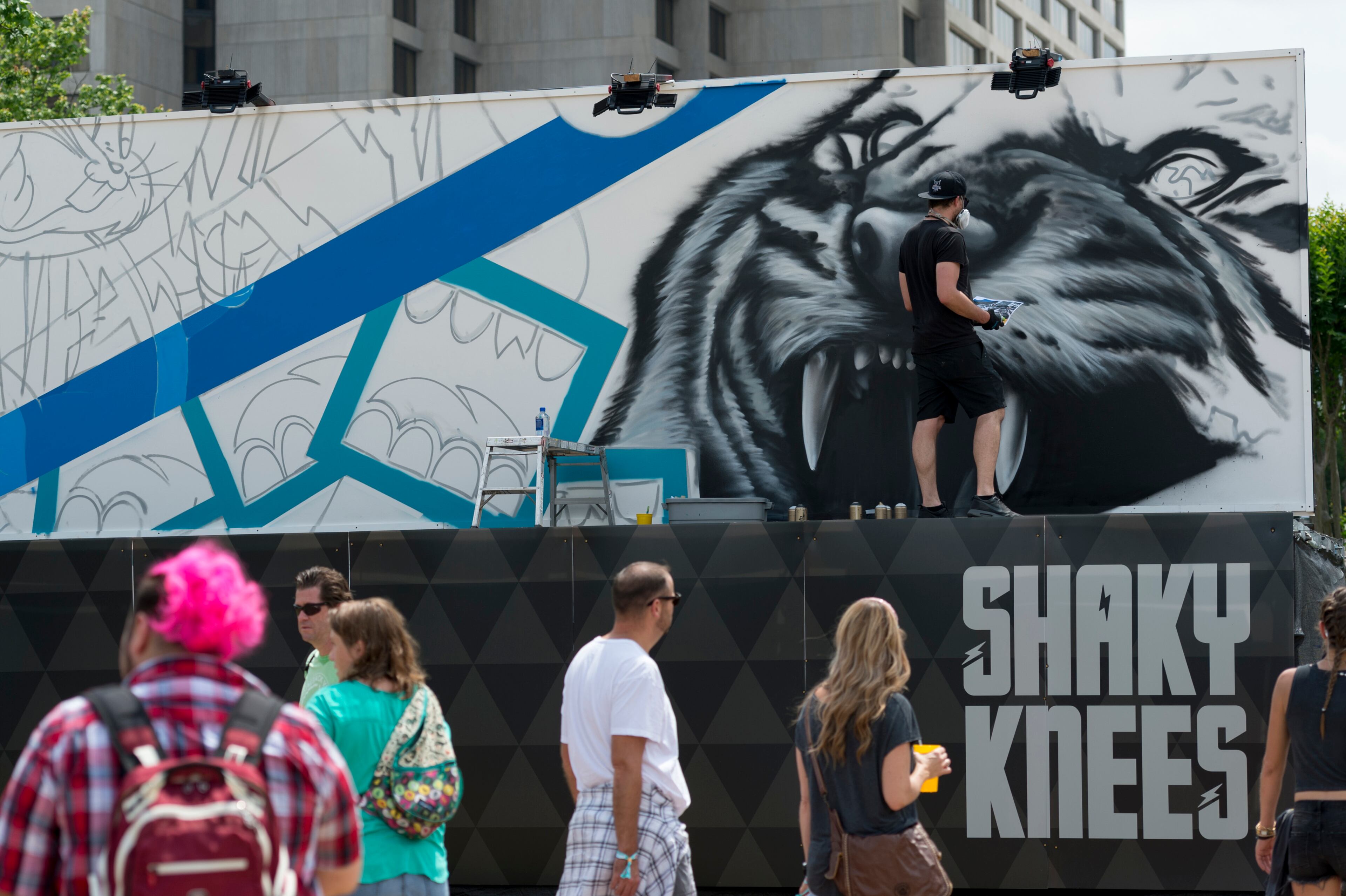 May 12, 2017, Atlanta - A painter works on a mural during the Shaky Knees Music Festival in Atlanta, Georgia, on Friday, May 12, 2017. (DAVID BARNES / DAVID.BARNES@AJC.COM)