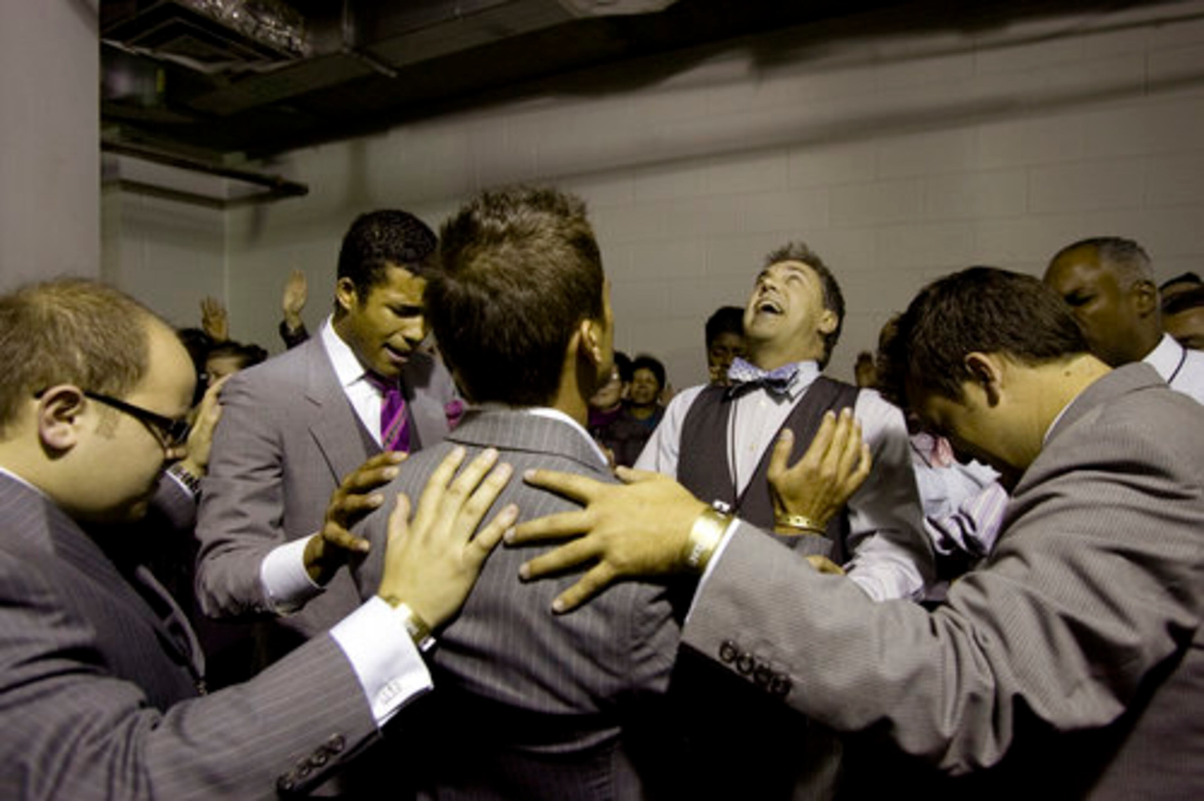 Sharing prayer before the performance.