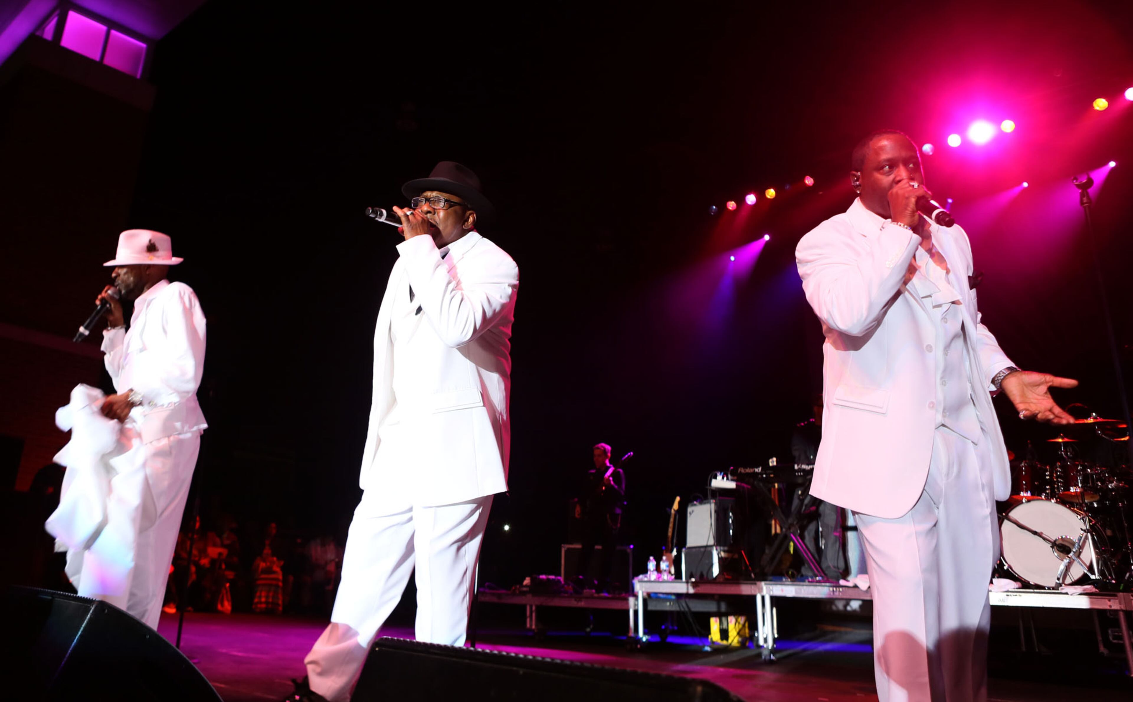 From left, Ralph Tresvant, Bobby Brown and Johnny Gill, the former New Edition members reunited as The Heads of State during Funk Fest. The concert celebrated its 20th Anniversary at Wolf Creek Amphitheater on Friday. (Akili-Casundria Ramsess/Special to the AJC)