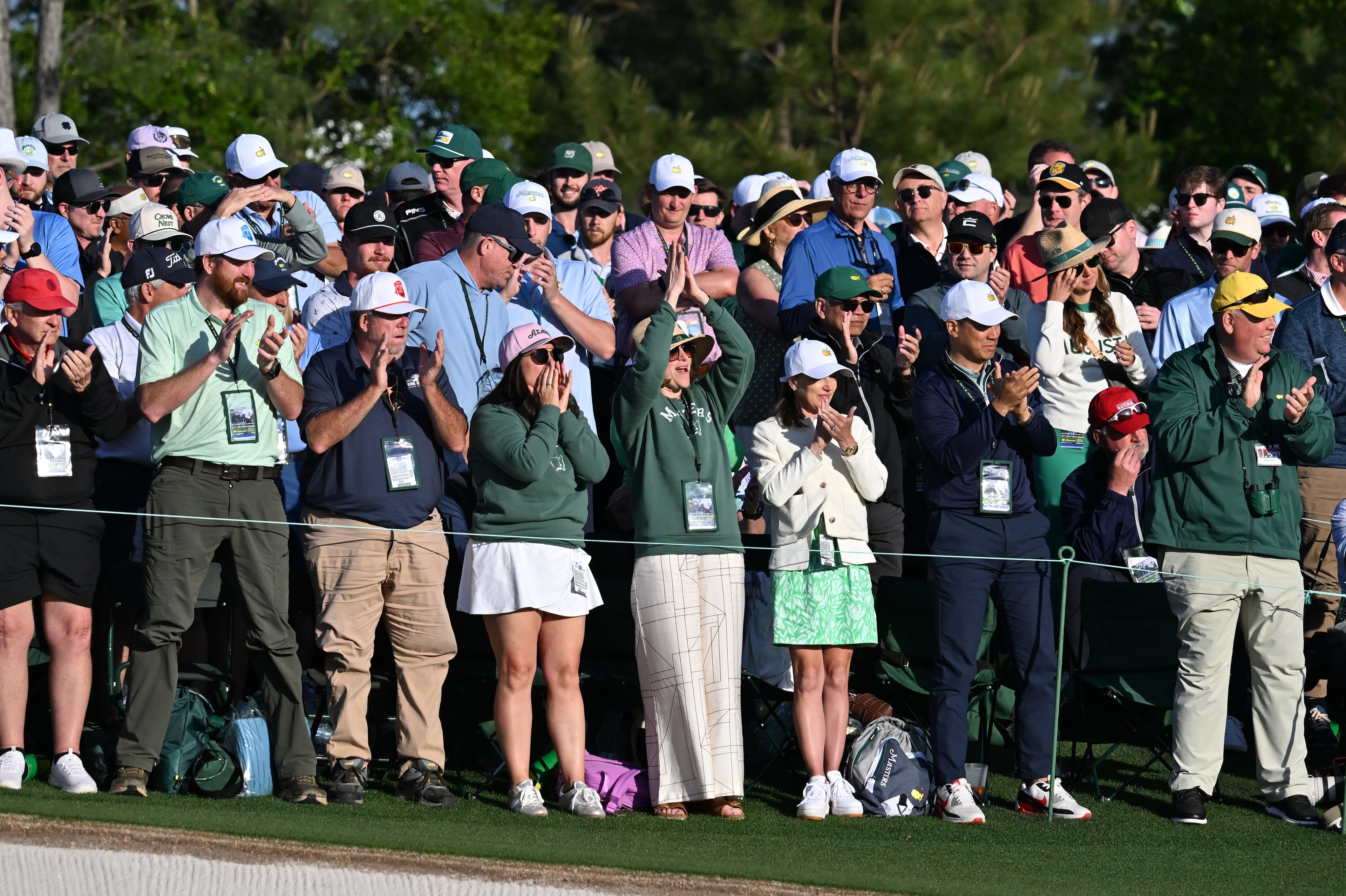Patrons cheer Rory McIlroy on 18th green during third round of the Masters golf tournament, at Augusta National Golf Club, Saturday, April 12, 2025, in Augusta, Ga. (Hyosub Shin / AJC)