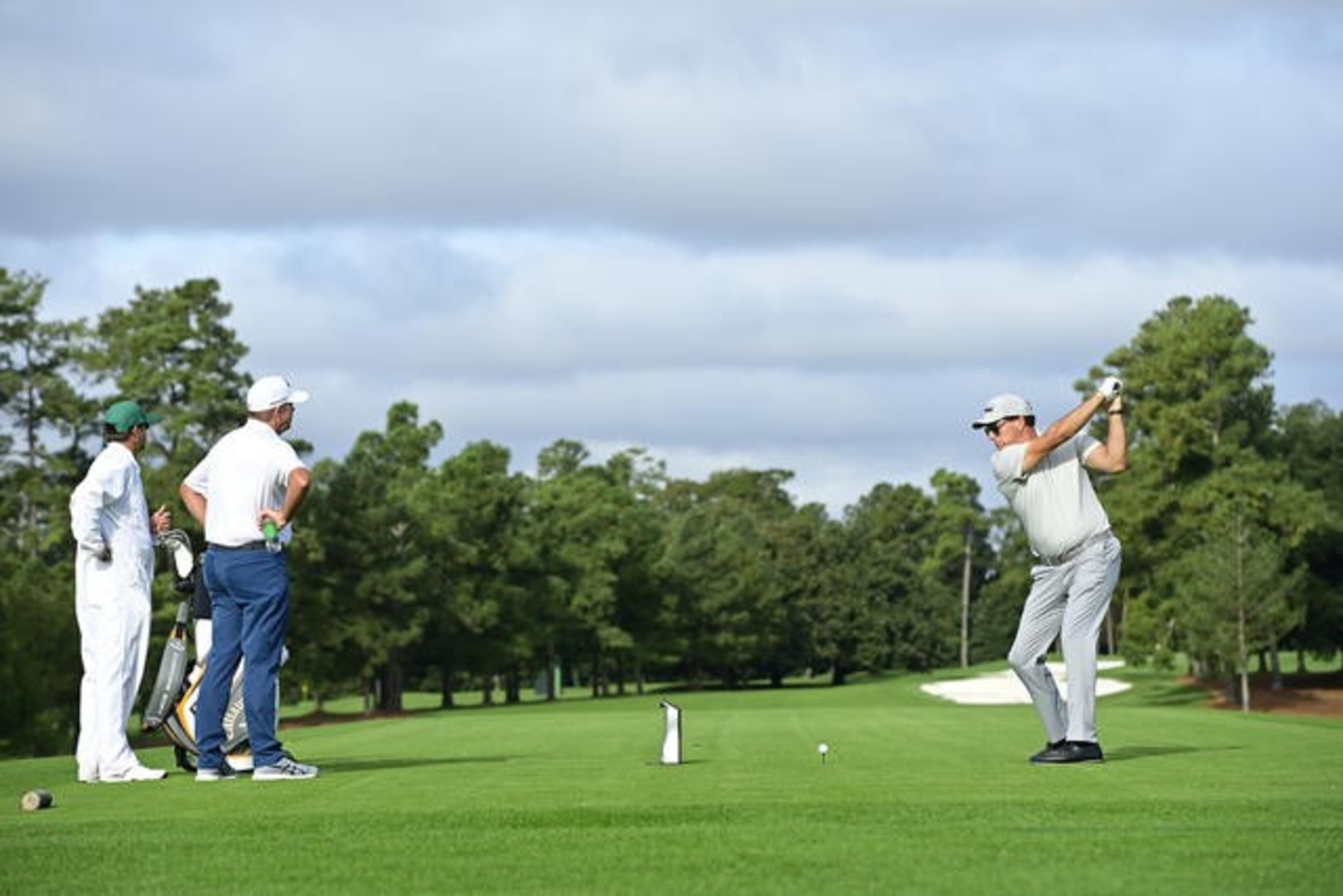Former Masters champion Phil Mickelson drives from the No. 1 tee during the practice round for the Masters at Augusta National Golf Club Sunday, Nov. 8, 2020, in Augusta, Ga..