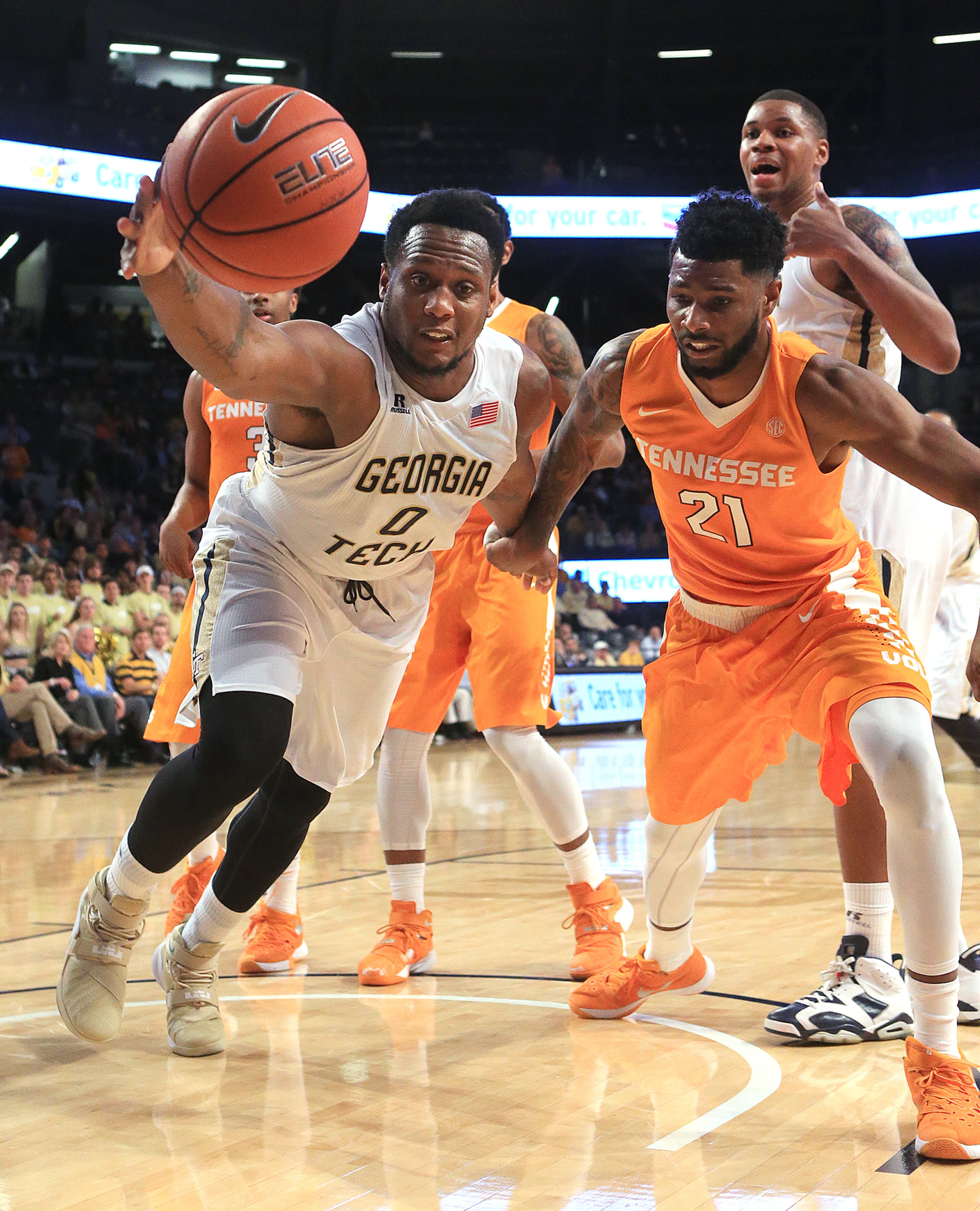 Georgia Tech defender Charles Mitchell takes the ball away from Tennessee forward Jabari McGhee during the first half in a basketball game on Monday, Nov. 16, 2015 in Atlanta. Curtis Compton / ccompton@ajc.com