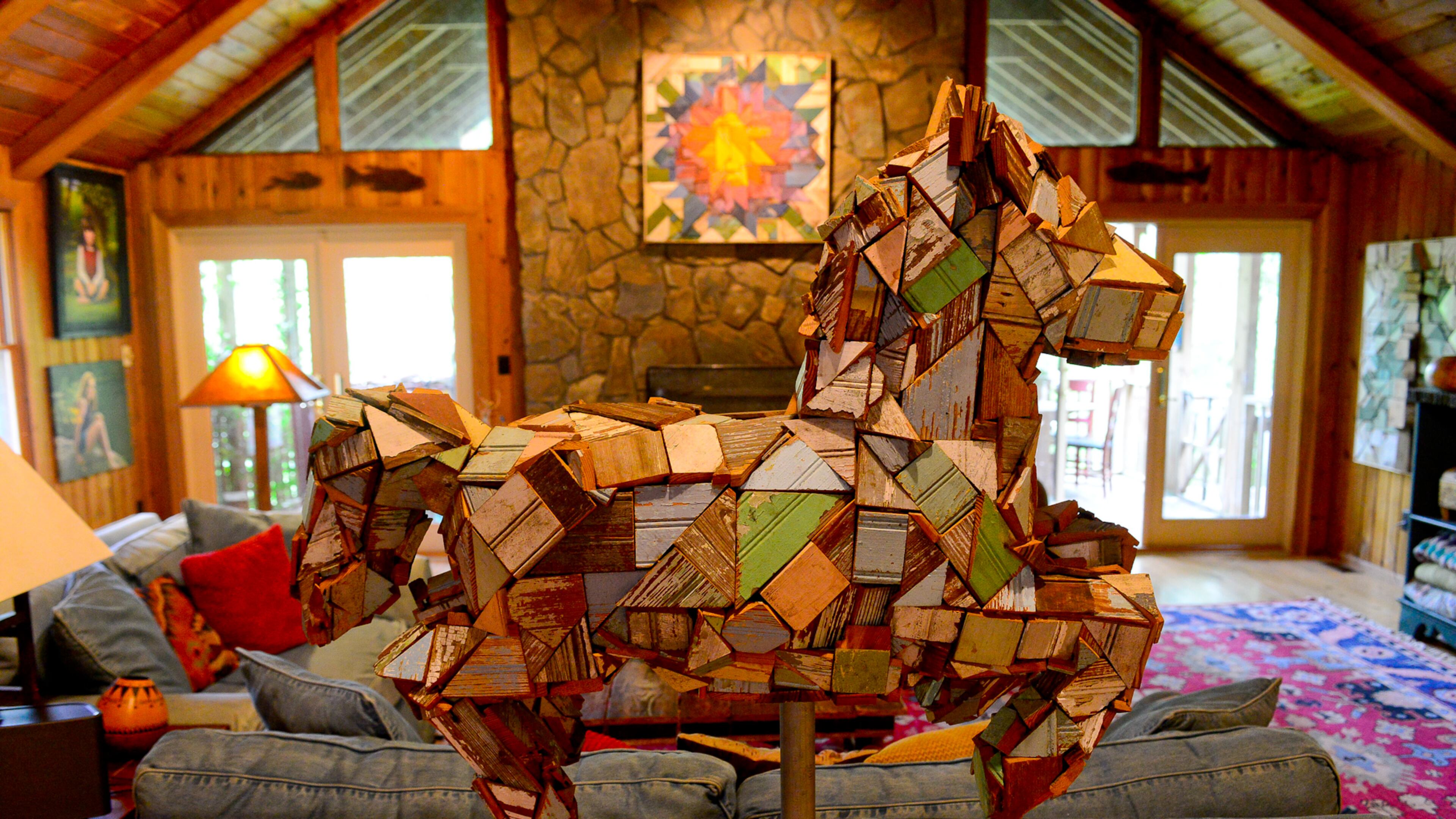 Homeowner and artist Sherry Cook reused wood architectural elements salvaged from old homes for this folk art sculpture of a horse. (
