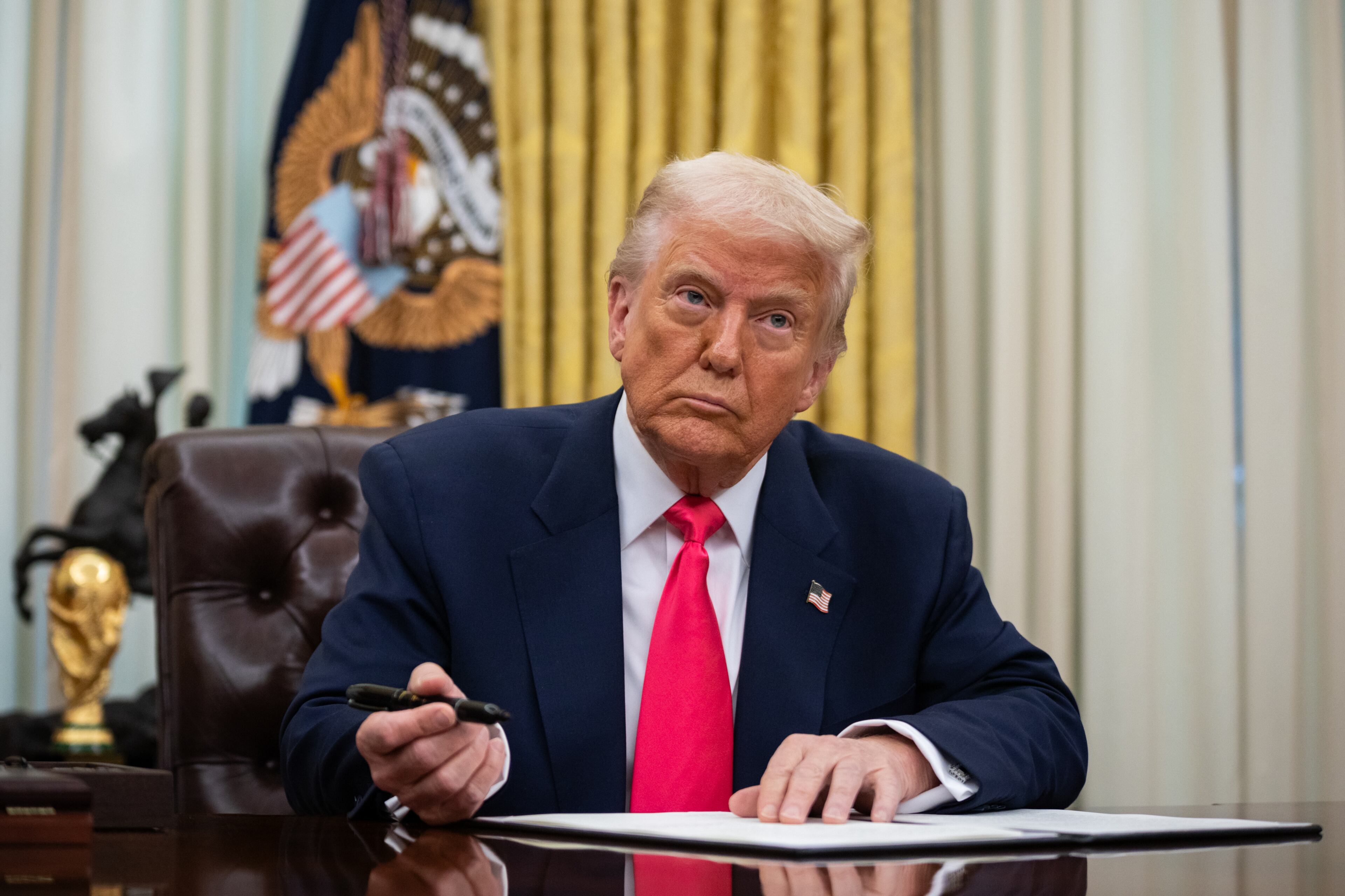 President Donald Trump as he signs executive orders in the Oval Office of the White House in Washington, March 6, 2025. Germany and the rest of Europe have been forced to recalibrate after President Trump returned to office. (Maansi Srivastava/The New York Times)