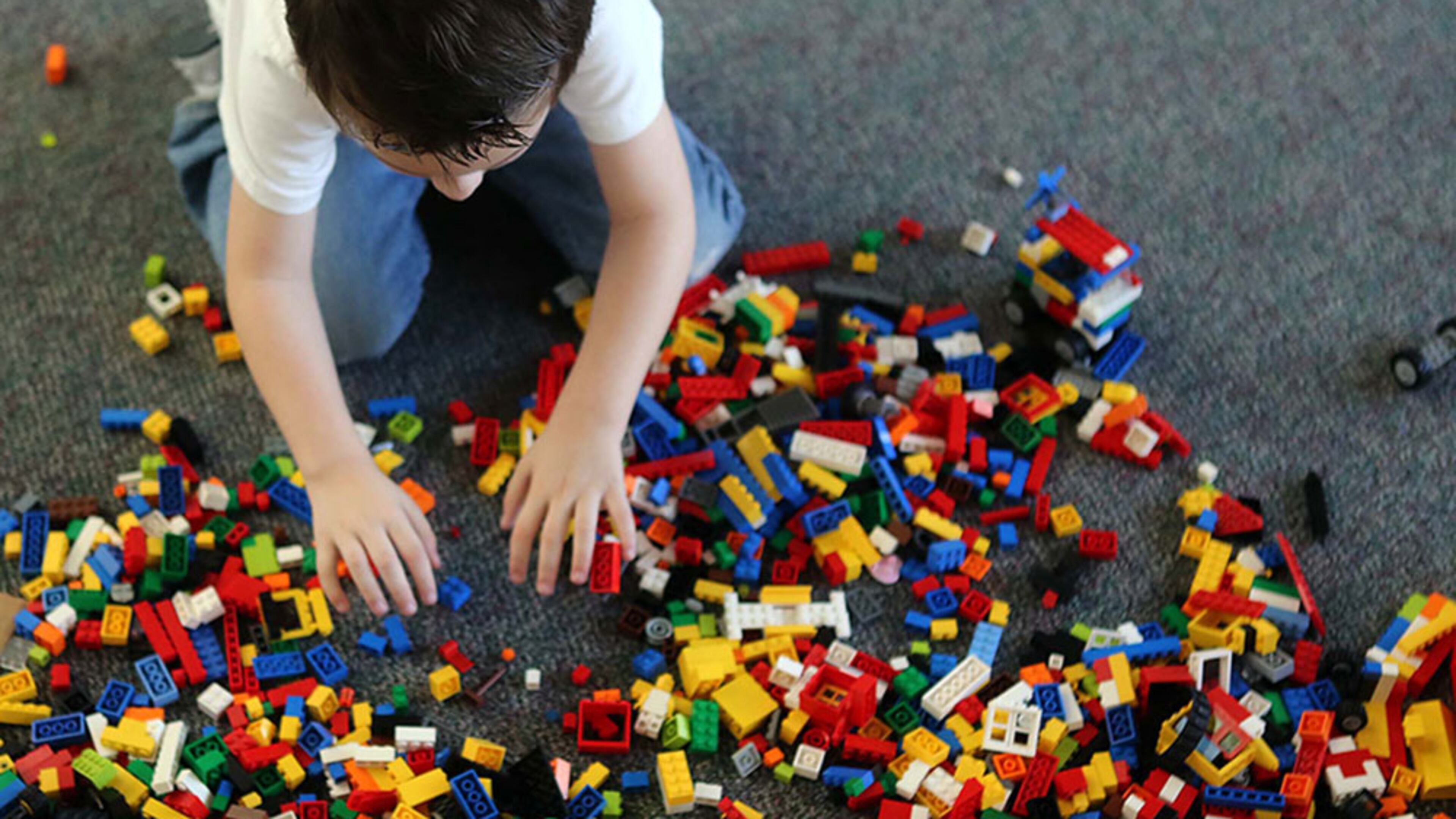 Ryan Radomski plays with Legos at the Family Place in Blake Library on February 7, 2013.