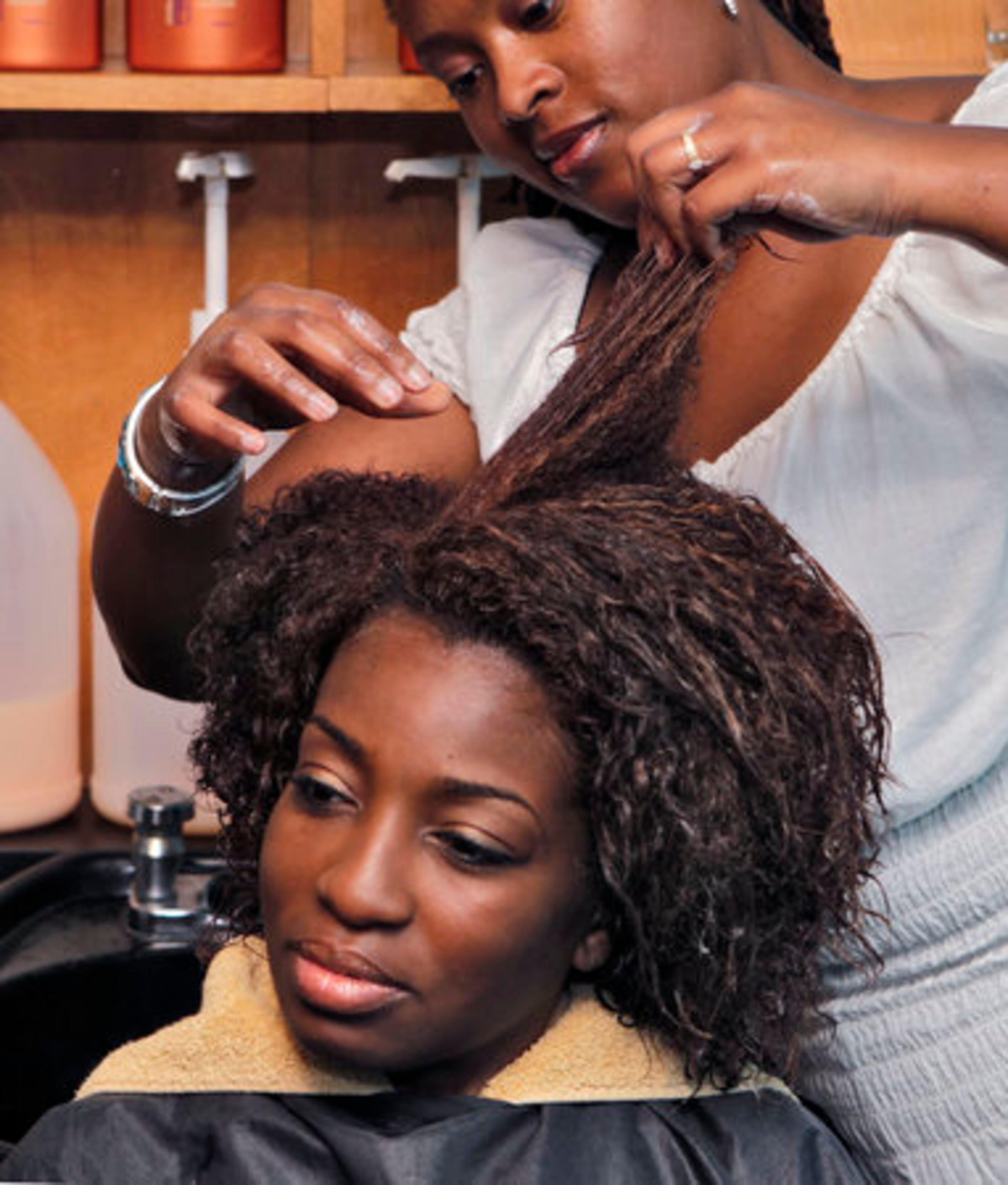 The first step is a shampoo followed by a conditioner and "finger combing." The salon has been "all natural", meaning it offers no chemical straighteners to clients, for four years.