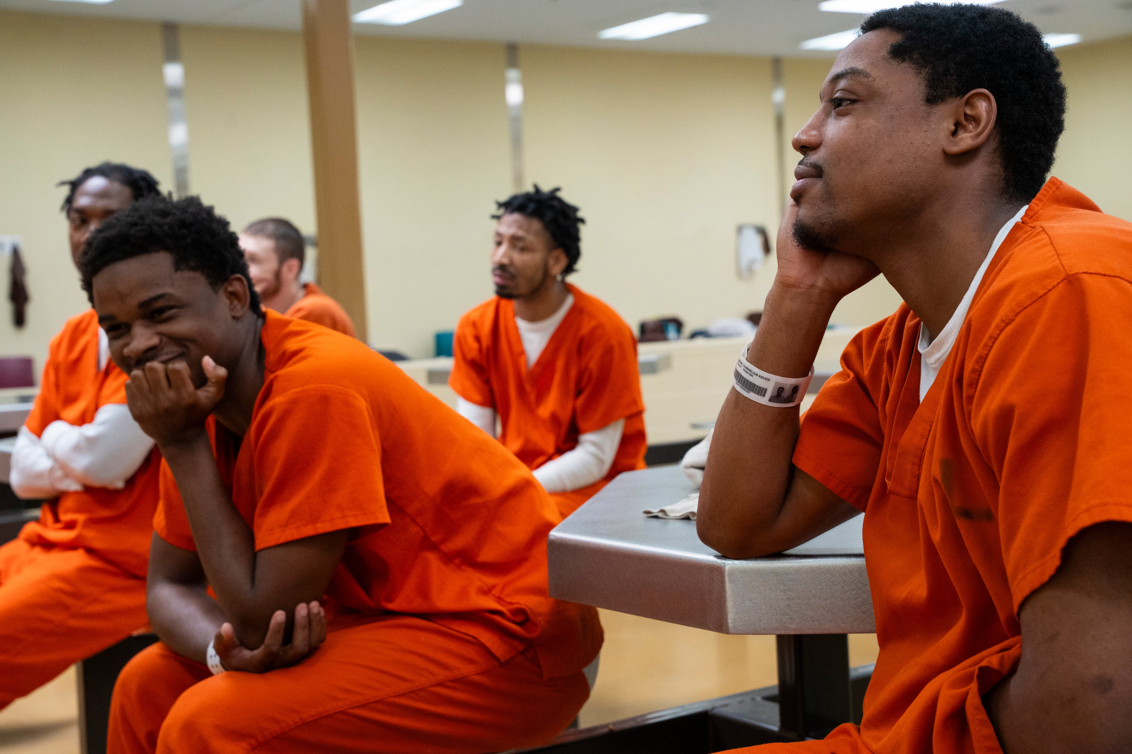 Inmates listen as Shane Sims guides a discussion in the Athens-Clarke County Jail. A few weeks into the program, there are signs of progress. “This group is exactly what I wanted,” Sims says. (Olivia Bowdoin for the AJC)