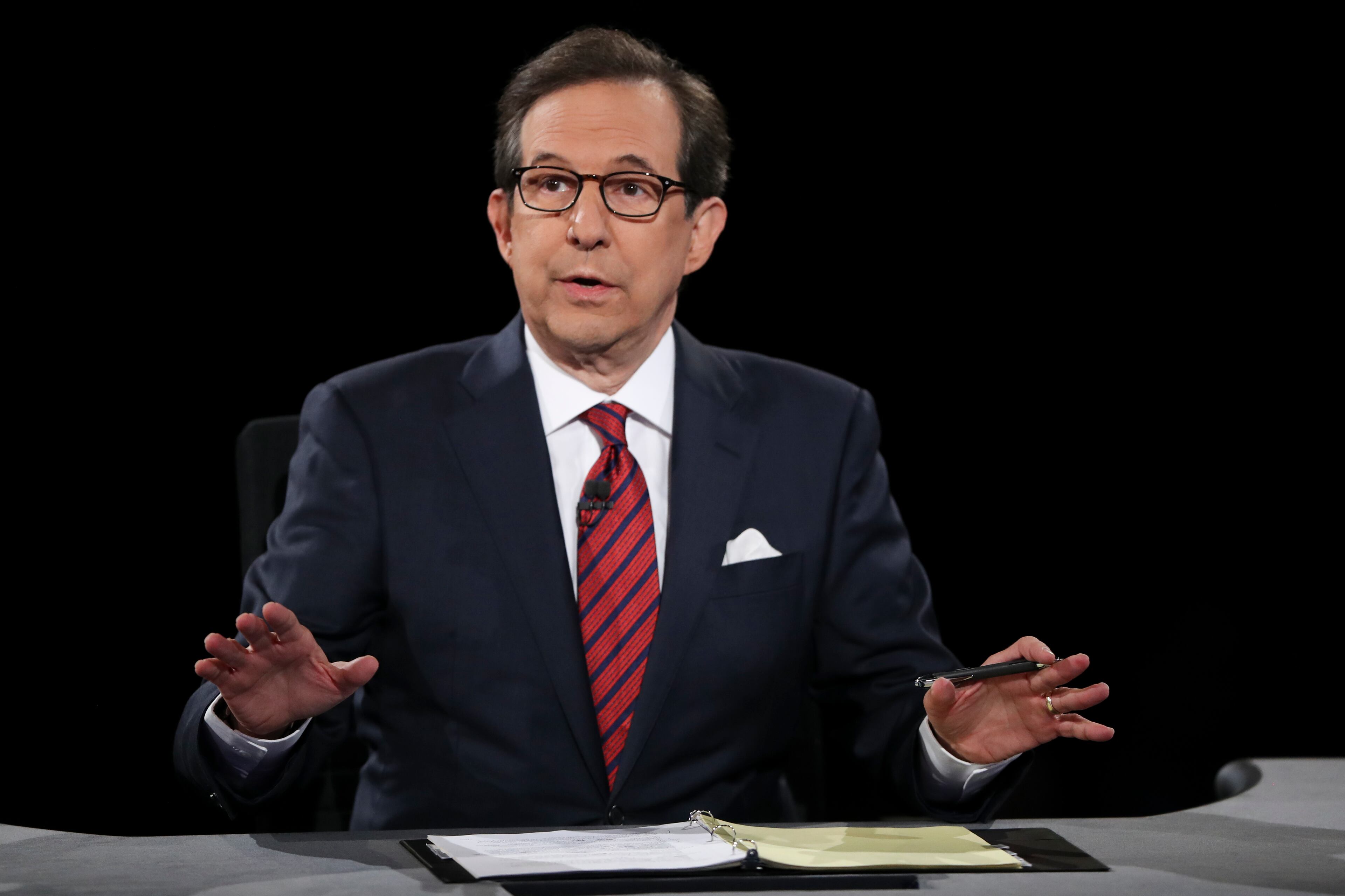 Moderator Chris Wallace of Fox News guides the discussion between Democratic presidential nominee Hillary Clinton and Republican presidential nominee Donald Trump during the third presidential debate at UNLV in Las Vegas, Wednesday, Oct. 19, 2016. (Joe Raedle/Pool via AP)