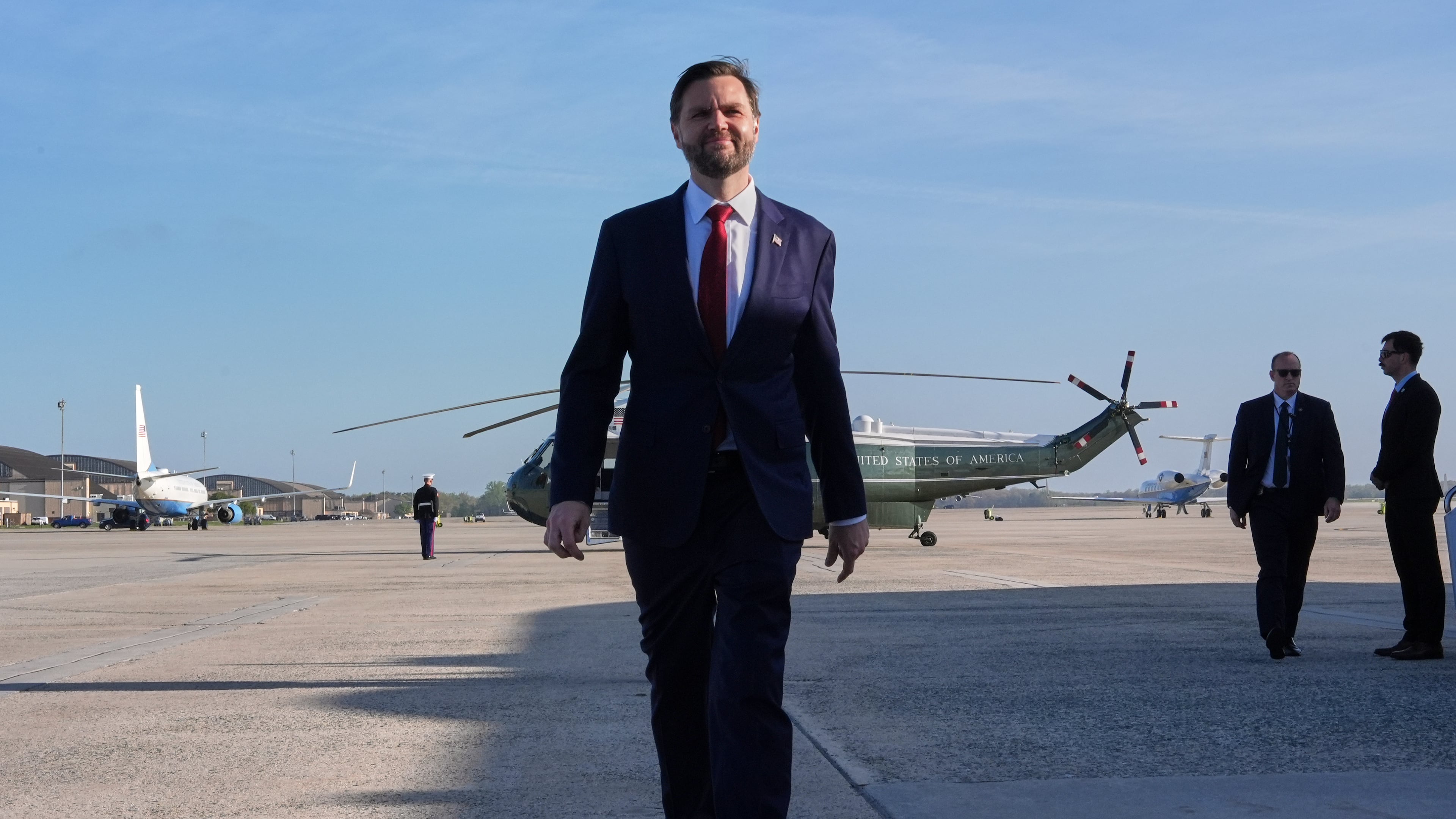 Vice President JD Vance walks to speak with the Press before boarding Air Force Two, Friday, April 10, 2026, at Joint Base Andrews, Md., for expected departure to Pakistan, for talks on Iran. (AP Photo/Jacquelyn Martin, pool)