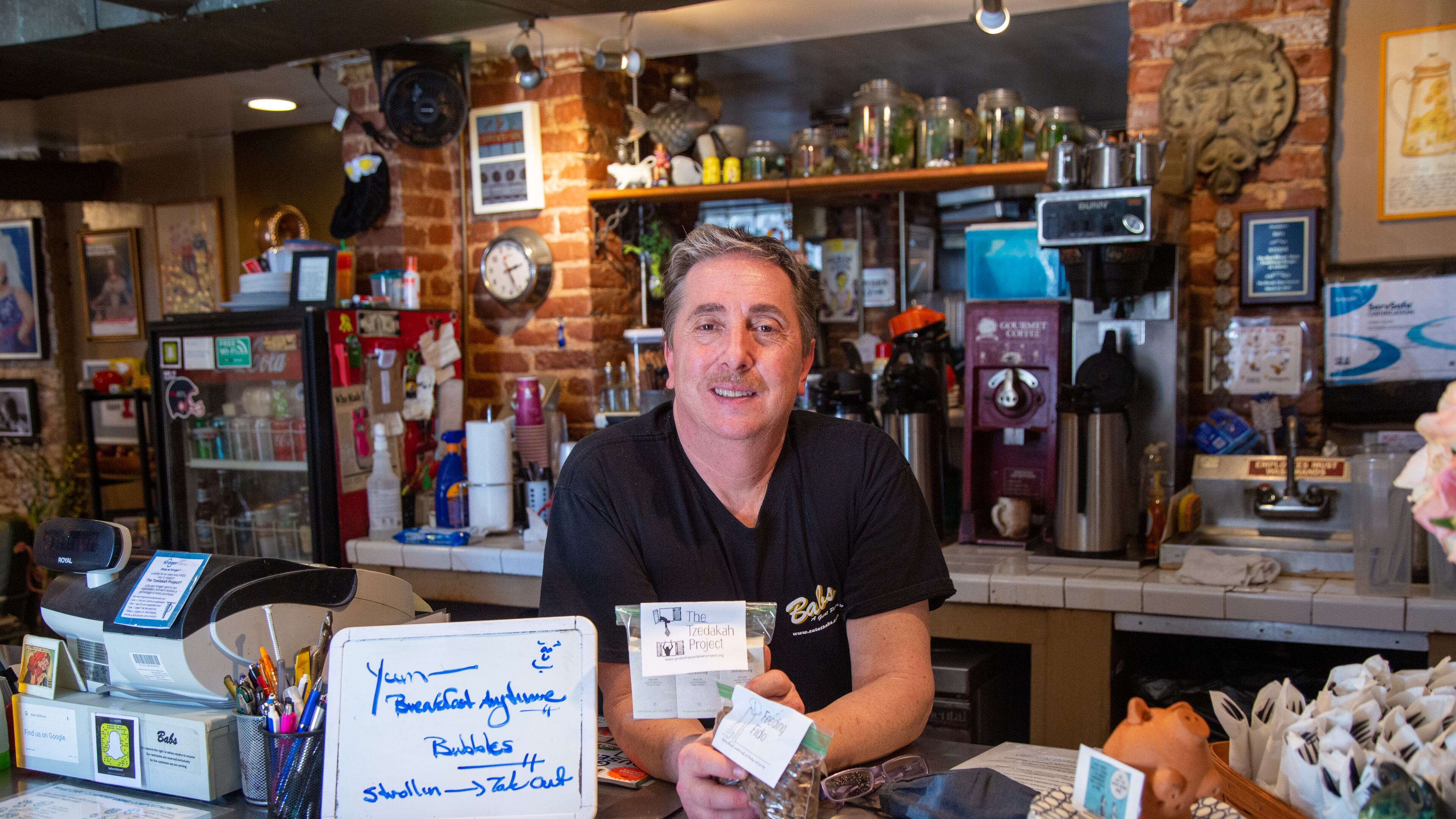 Babs Midtown restaurant owner Randy Adler talks about the Tzedakah project, the nonprofit he started to help those affected by the pandemic. Through a series of programs, the Tzedahak project provides meals, employment and other services to the community. PHIL SKINNER FOR THE ATLANTA JOURNAL-CONSTITUTION.