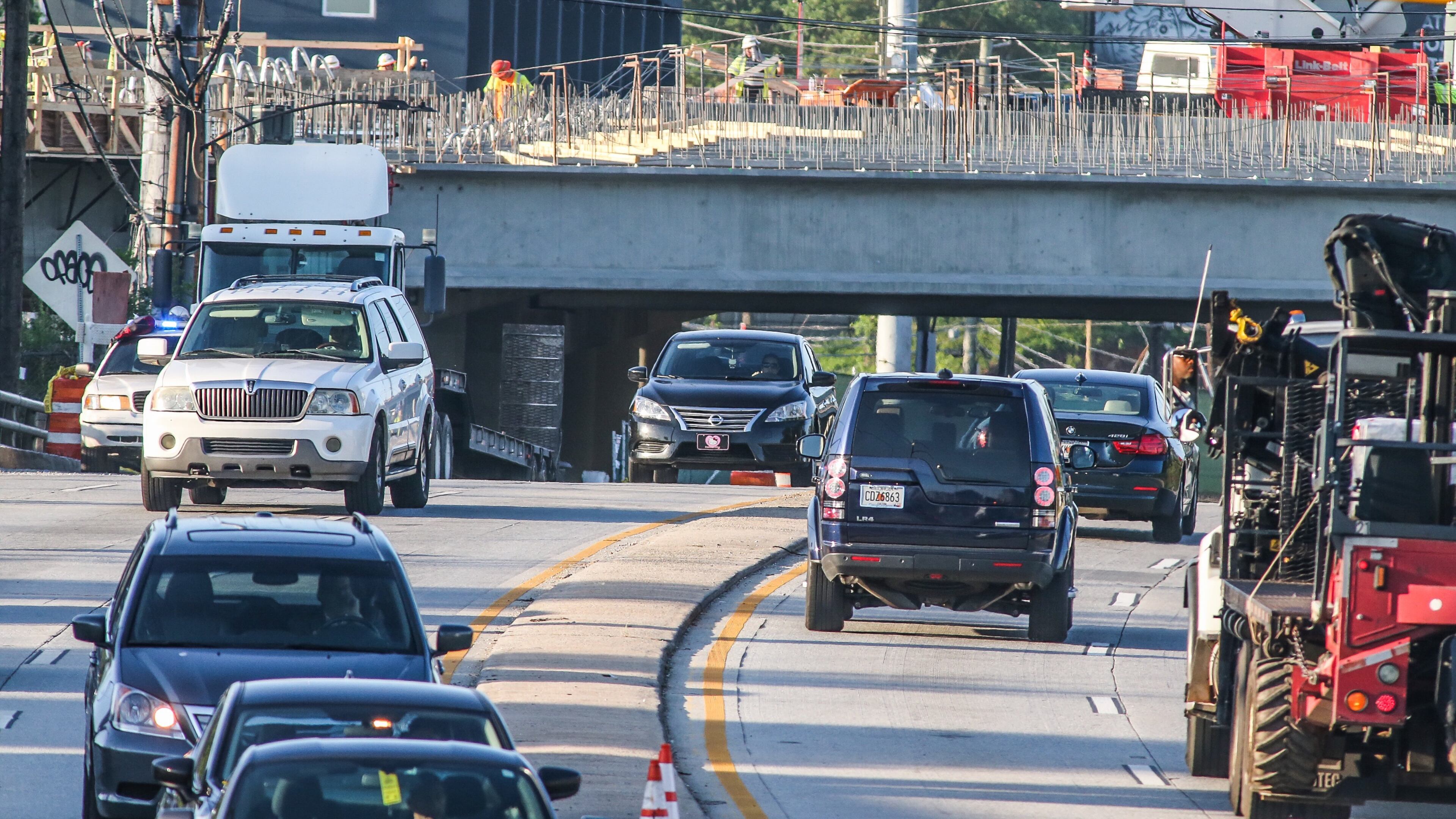Traffic was flowing on Piedmont Road again Wednesday morning. The road, which had been closed since 9 a.m. Tuesday for I-85 bridge repairs, reopened more than an hour ahead of schedule. JOHN SPINK/JSPINK@AJC.COM