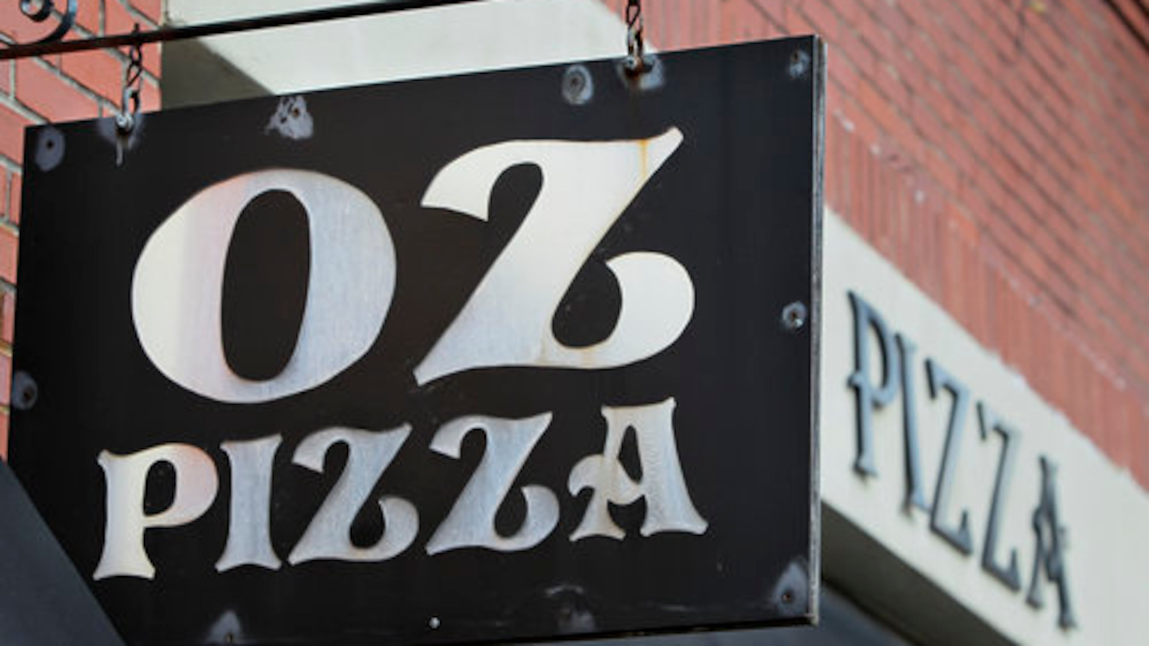 Oz Pizza is across the street from a MARTA station in East Point