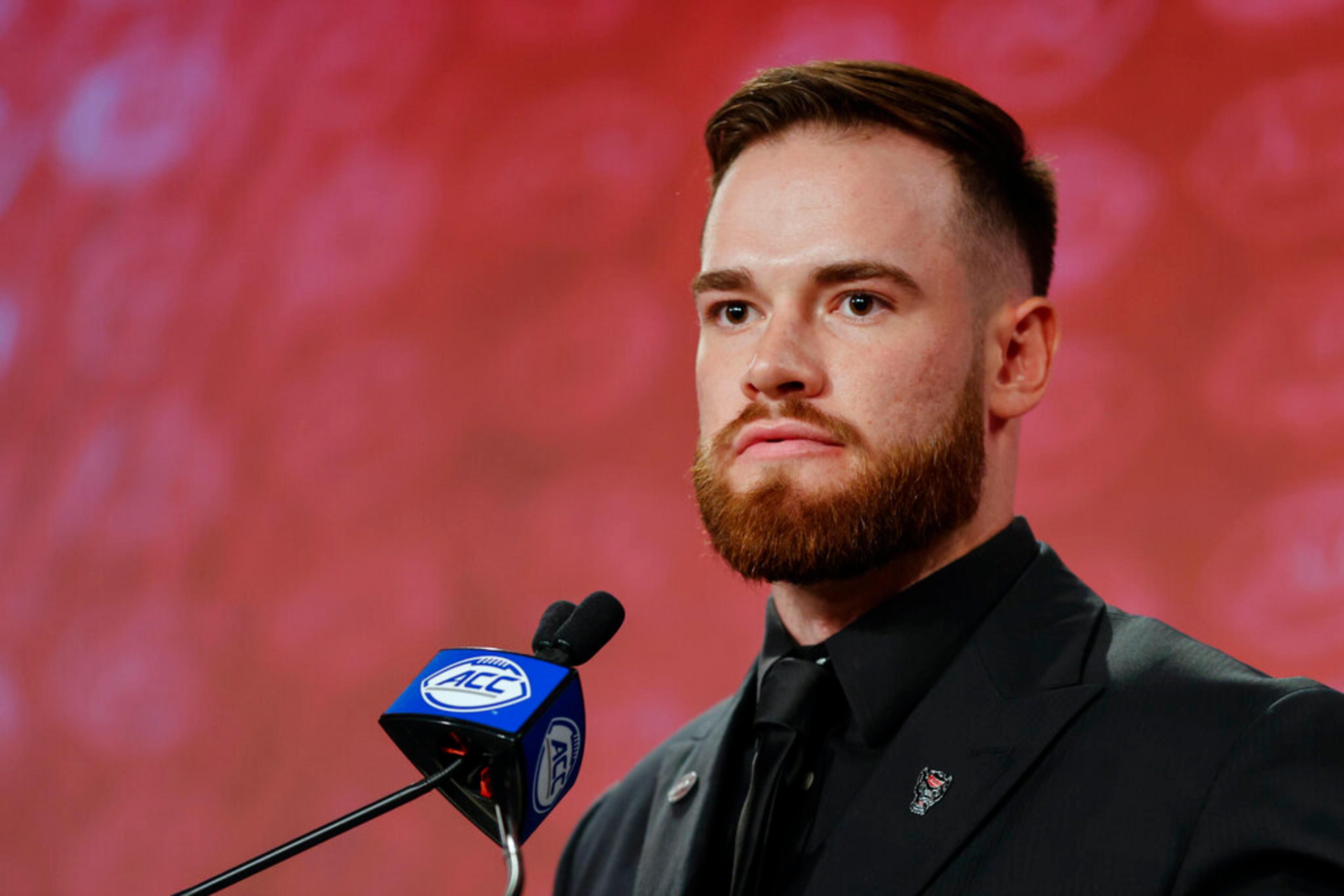 North Carolina State quarterback Devin Leary answers a question at the NCAA college football Atlantic Coast Conference Media Days in Charlotte, N.C., Wednesday, July 20, 2022. (AP Photo/Nell Redmond)