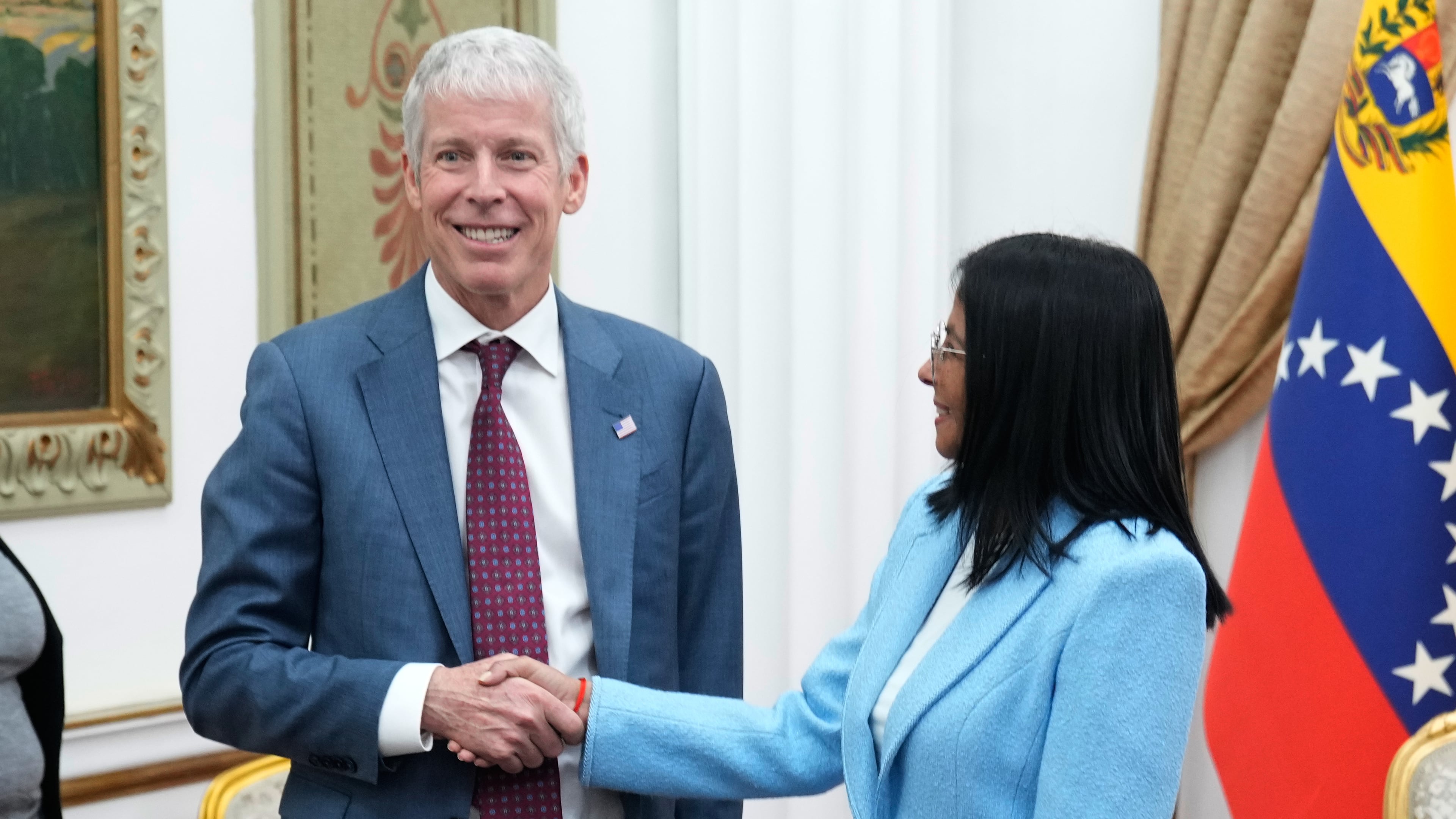 Venezuelan acting President Delcy Rodriguez greets U.S. Energy Secretary Chris Wright at Miraflores presidential palace in Caracas, Venezuela, Wednesday, Feb. 11, 2026. (AP Photo/Ariana Cubillos)