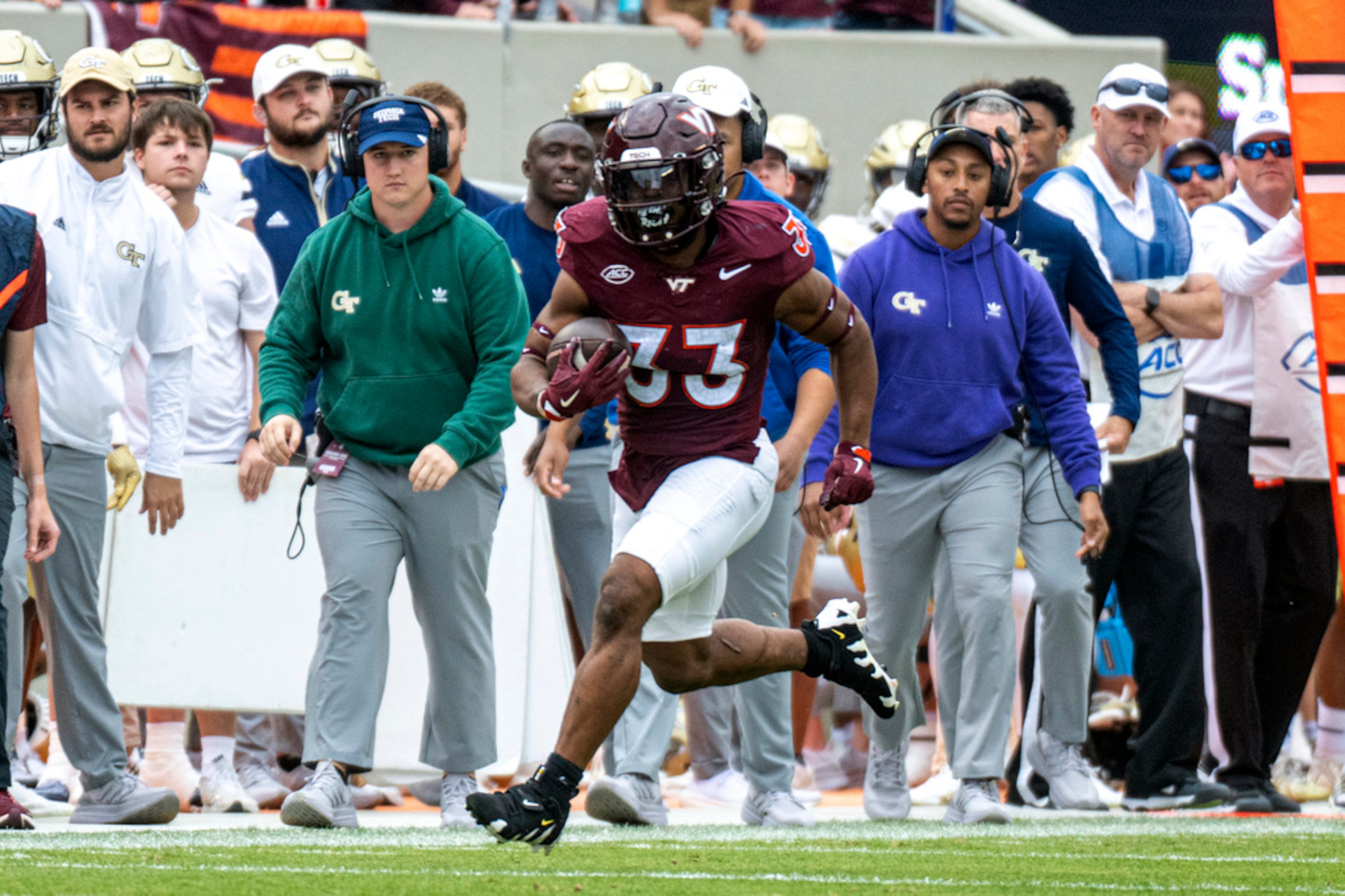 Virginia Tech's Bhayshul Tuten (33) runs for a big gain against Georgia Tech during the first half of an NCAA college football game, Saturday, Oct. 26, 2024, in Blacksburg, Va. (AP Photo/Robert Simmons)