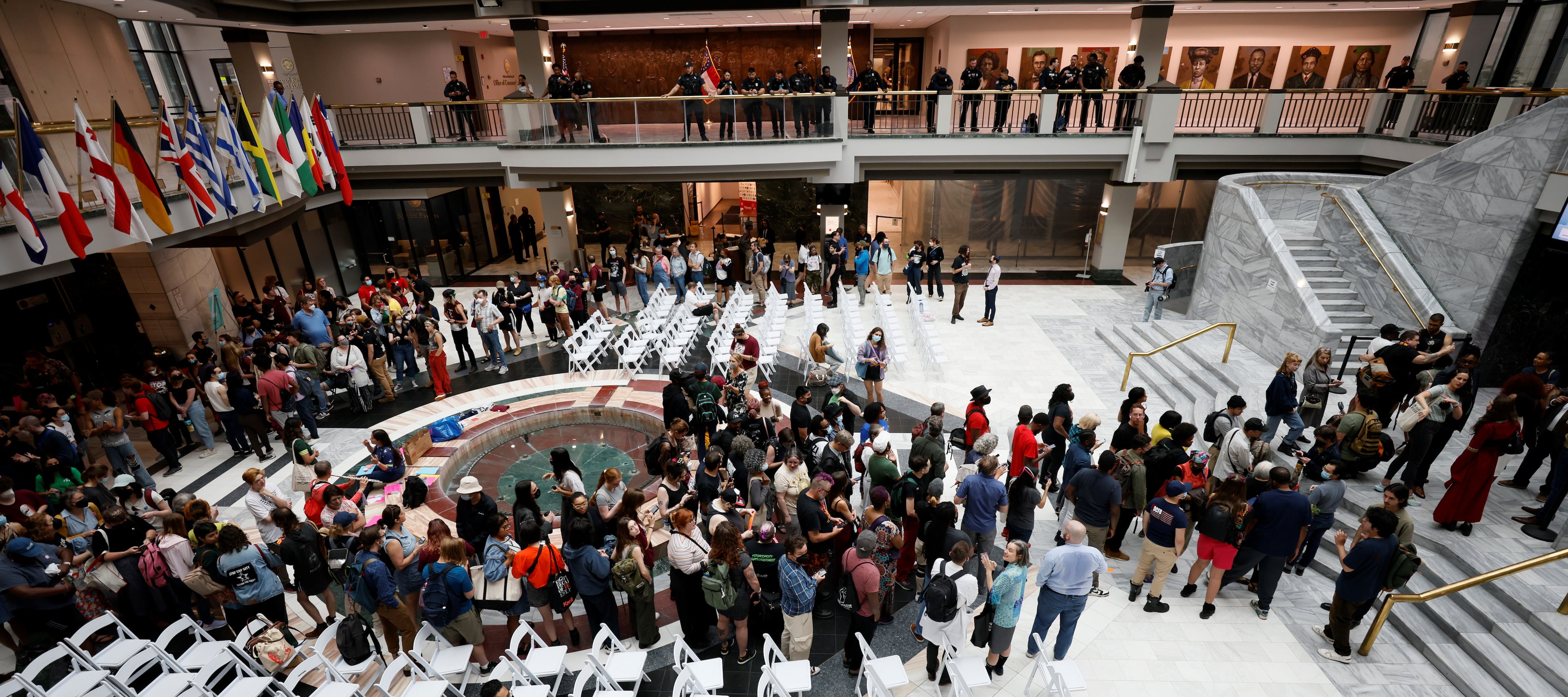 Crowds start to build inside the City Hall as the Council is set to give final approval to legislation that funds the training center.
Miguel Martinez /miguel.martinezjimenez@ajc.com