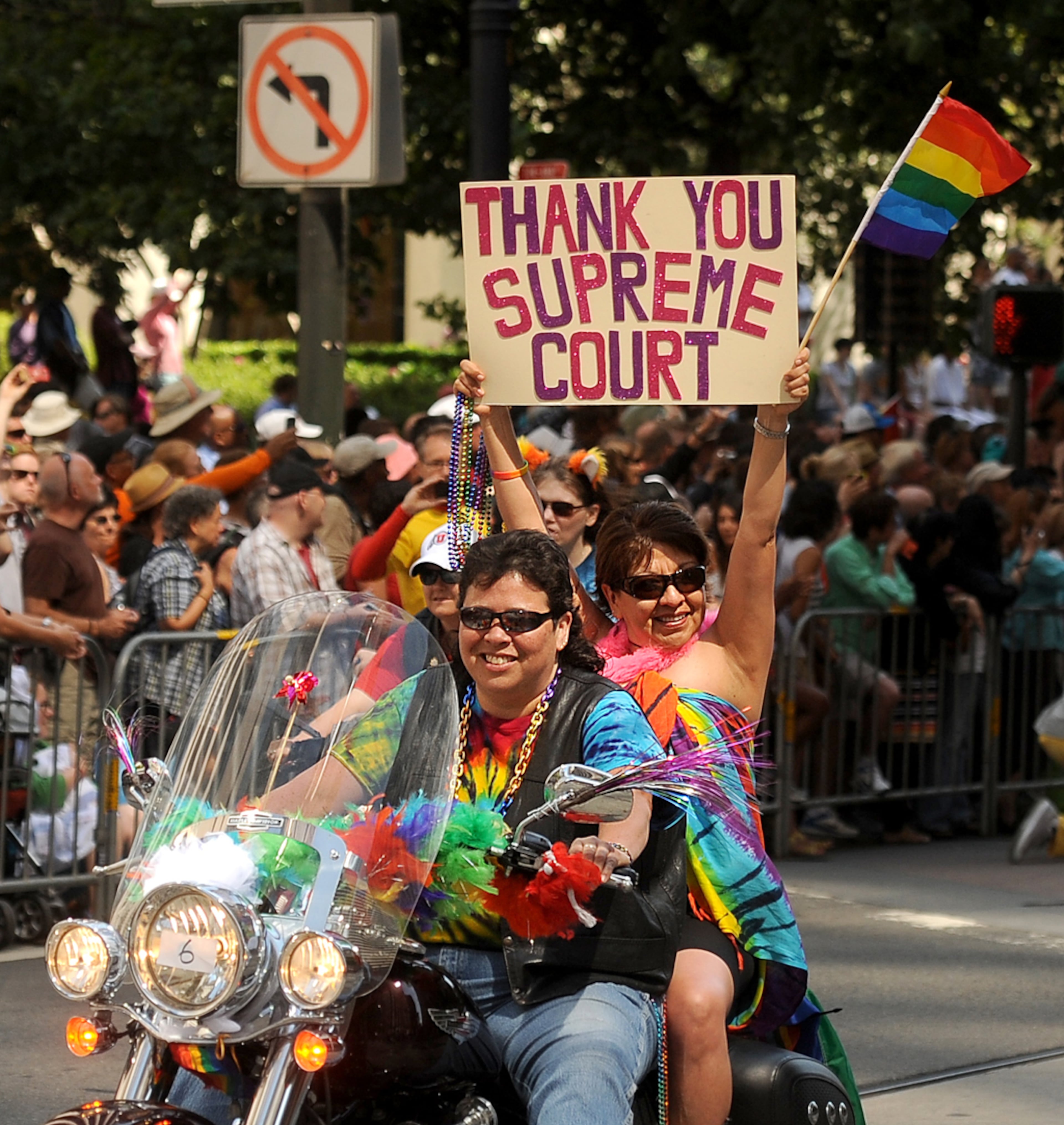 Participants ride up Market Street during San Francisco's 43rd annual Gay Pride parade Sunday, June 30, 2013. (AP Photo/Noah Berger)