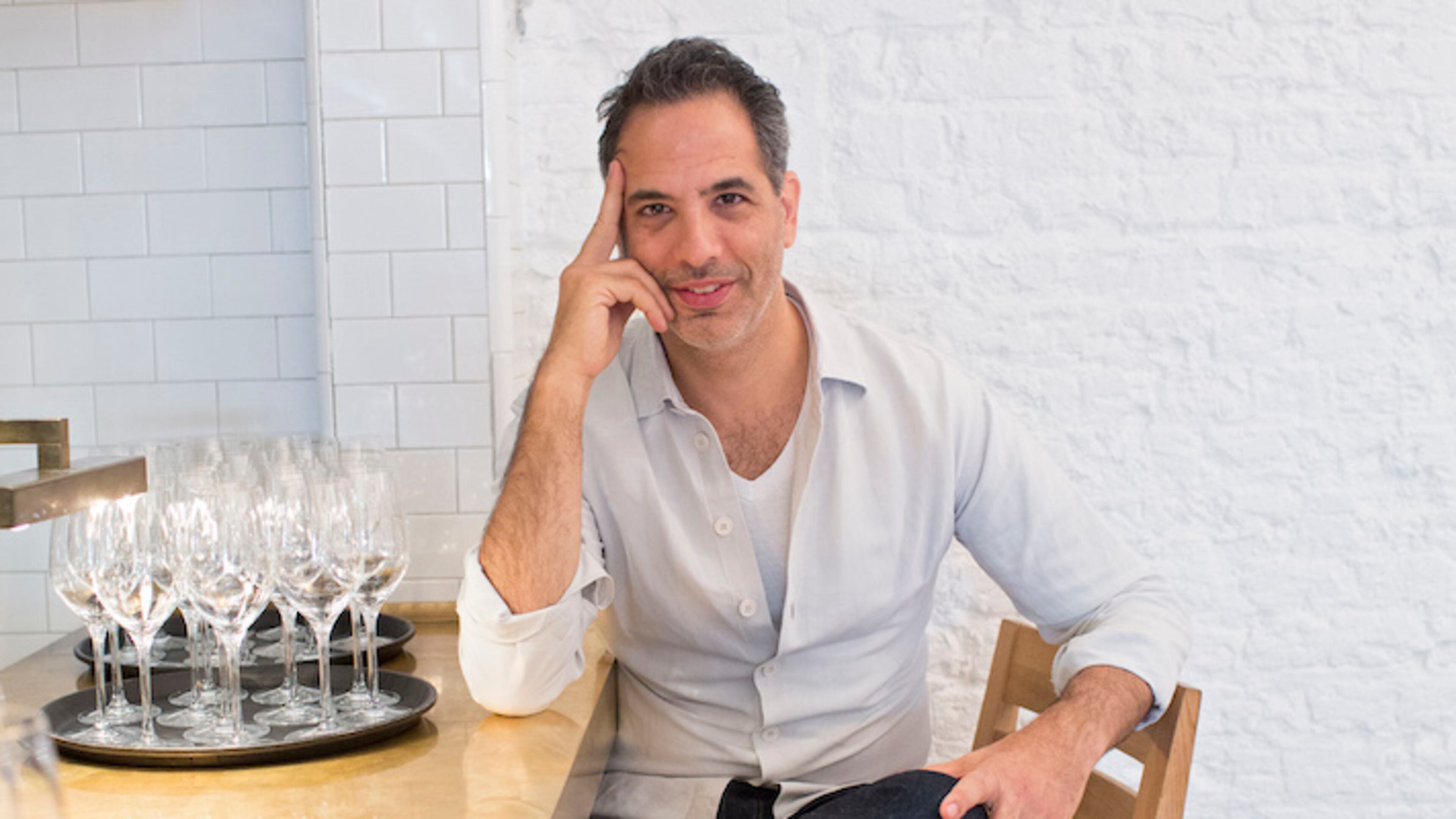 Chef and restauranteur Yotam Ottolenghi at his restaurant Nopi in London, Sept. 23, 2015. Ottolenghi, who has a weekly column in The Guardian, four bustling canteen-delis scattered across London and four best-selling cookbooks, achieved success by catering to the common man, bringing far-flung zesty ingredients into the cupboard of the formerly timid English home chef. (Lauren Fleishman/The New York Times)