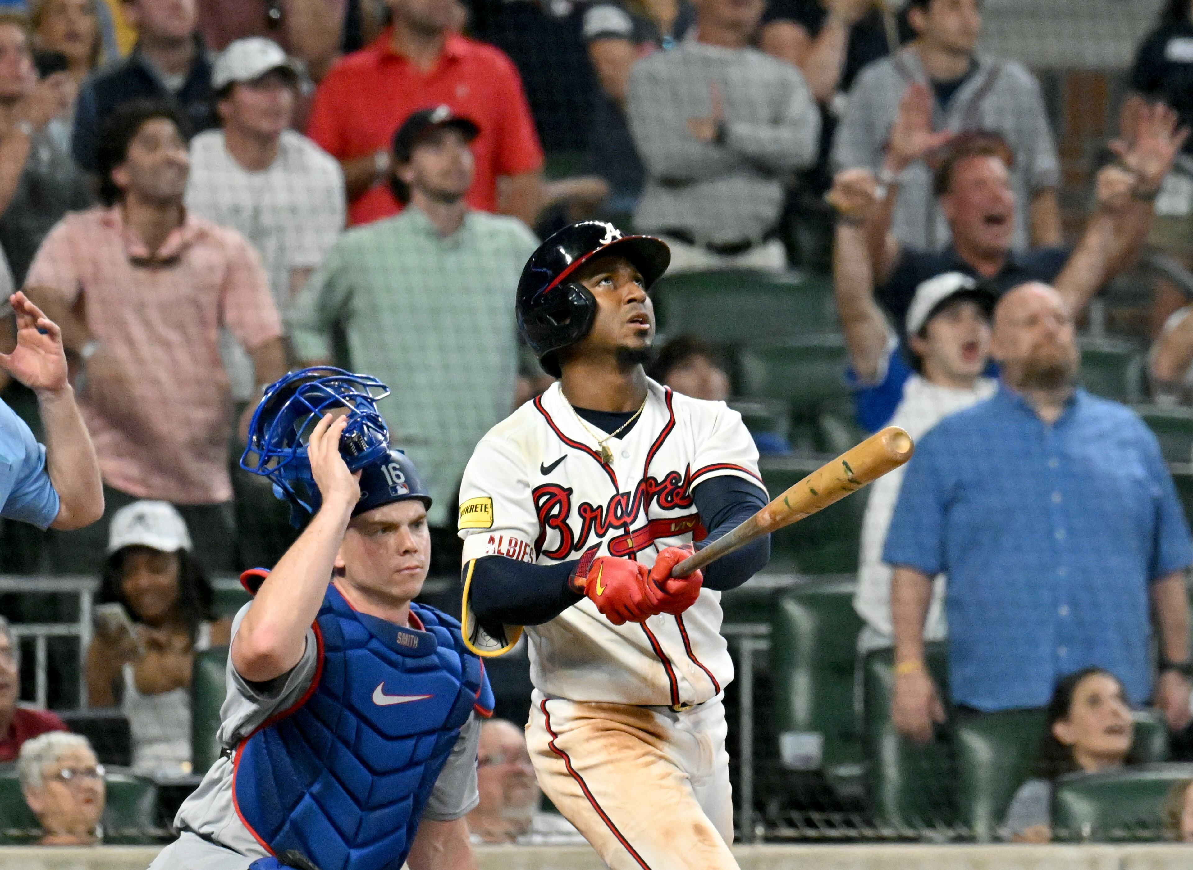 Braves second baseman Ozzie Albies (1) hits a walk-off fly ball to score third baseman Austin Riley to win the game. (Hyosub Shin / Hyosub.Shin@ajc.com)