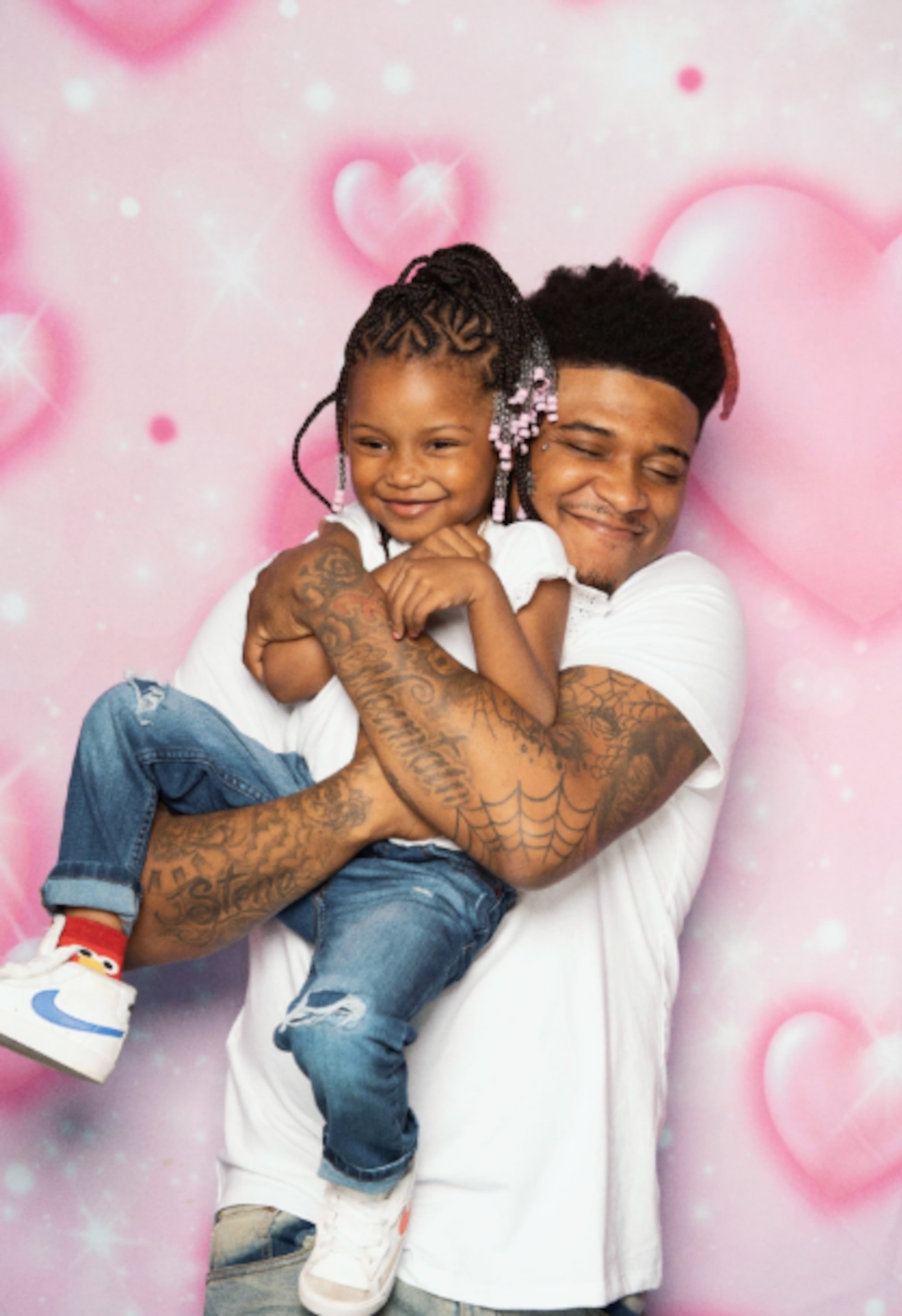 Rapper T-Hood, known for songs "Perculator" and "Ready 2 Go," is pictured here with his daughter, Shiloh. T-Hood died in a shooting on Aug. 8, 2025. (Courtesy of Yulanda Bandy)