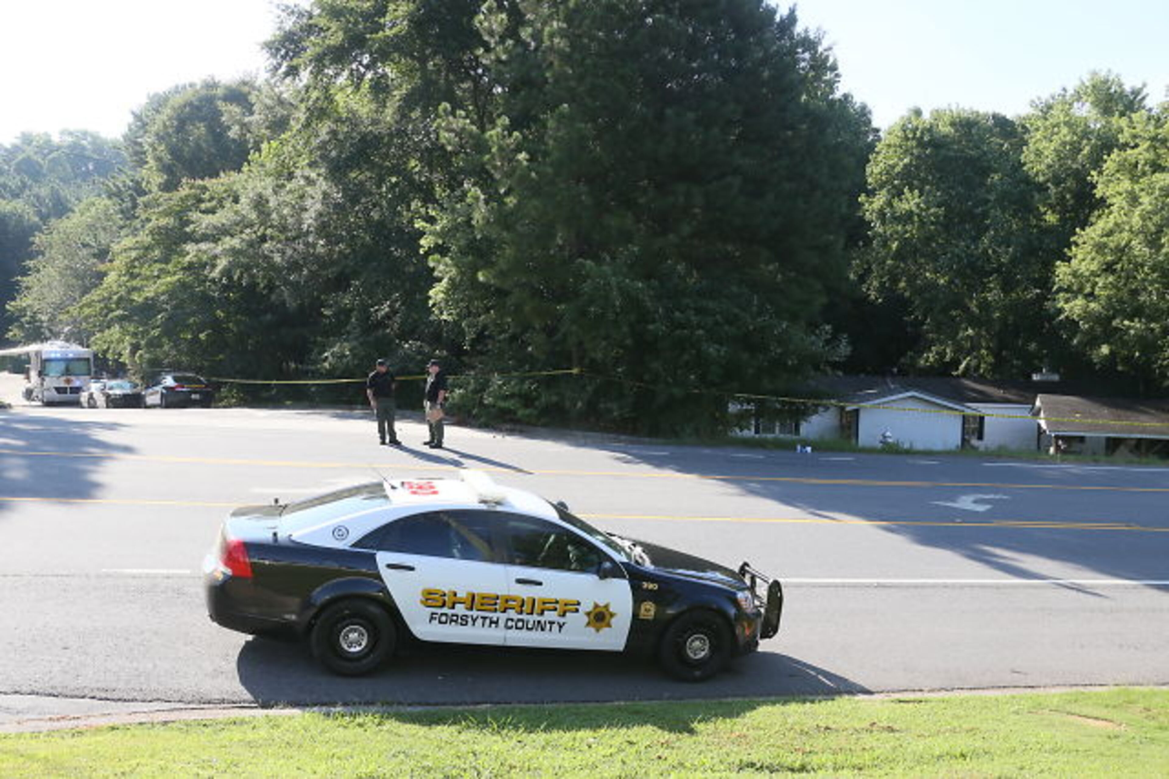 Forsyth sheriff’s Deputy Robin Regan confirmed four people died Wed., July 22, 2015, in a murder-suicide in the 5500 block of Old Atlanta Road. BOB ANDRES / BANDRES@AJC.COM
