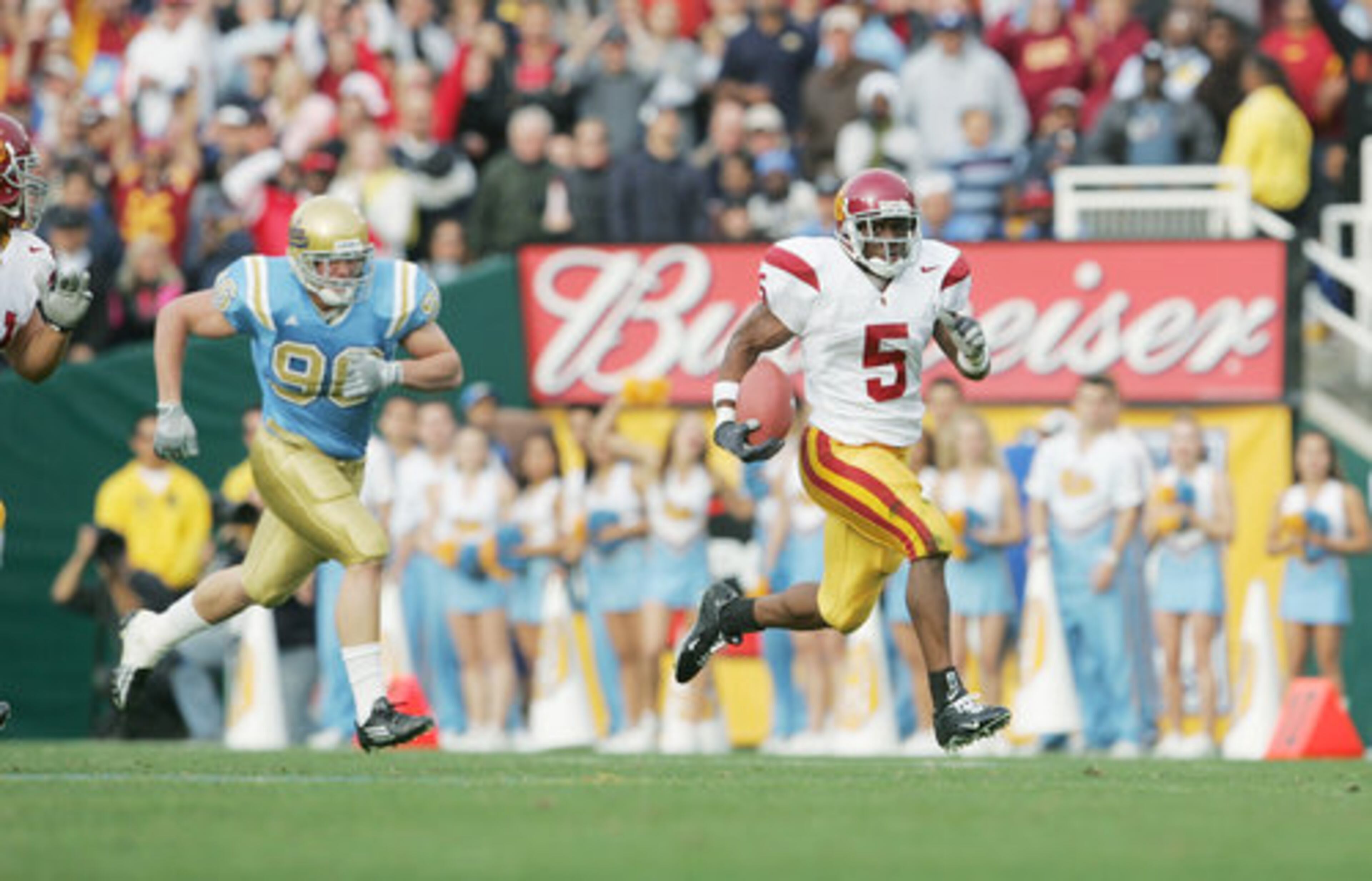 USC FOOTBALL: Reggie Bush, winner of the 2005 Heisman, was stripped of the award after it was revealed that his parents were paid hundreds of thousands of dollars by an agent. Southern California coach Pete Carroll left for the NFL, but the Trojans were stripped of 30 scholarships and given a two-year postseason ban.