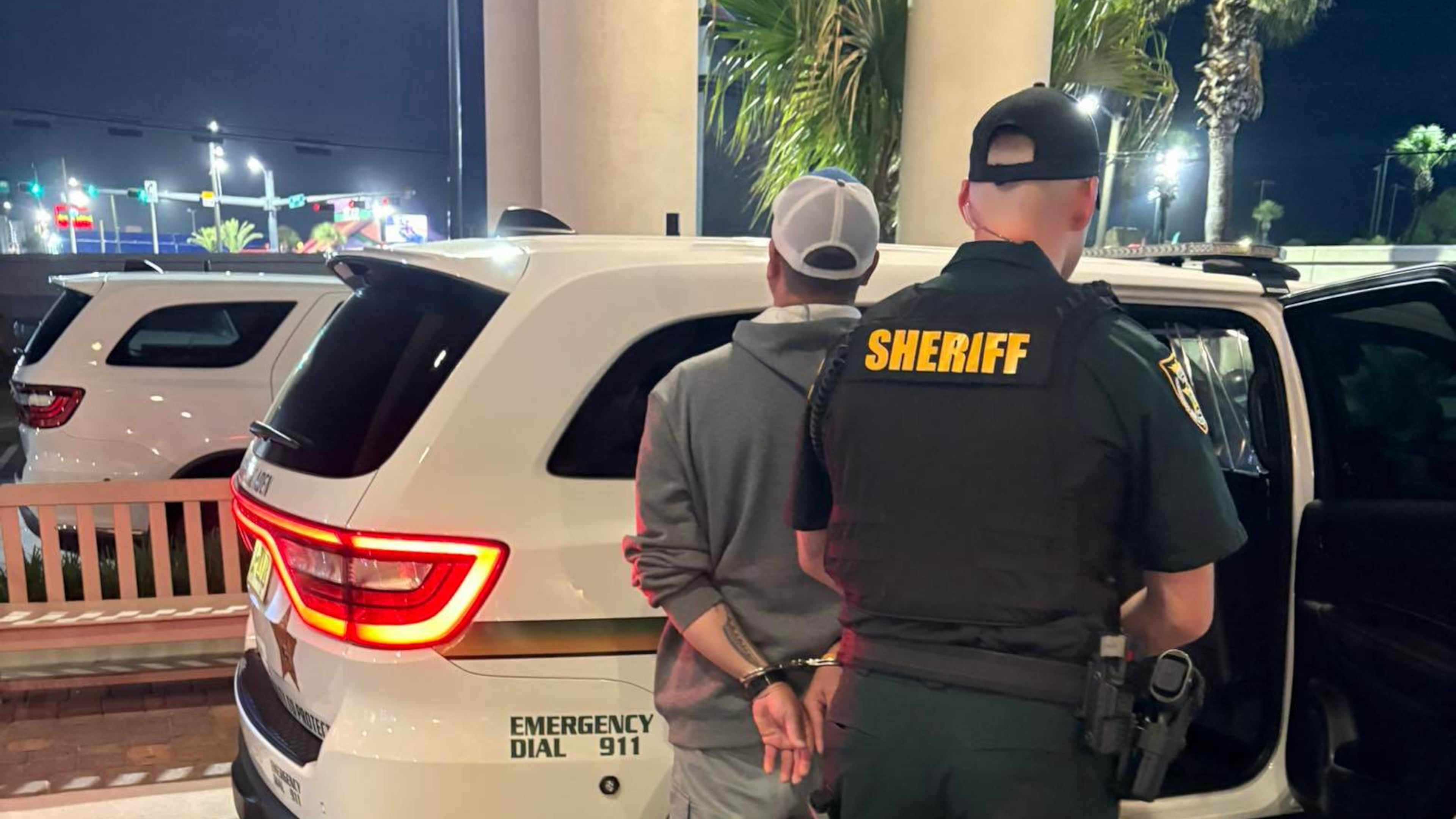 This photo provided by the Okaloosa County Sheriff's Office shows Christopher Gillum being arrested Wednesday, April 22, 2026, at a hotel in Destin, Fla. (Okaloosa County Sheriff's Office via AP)